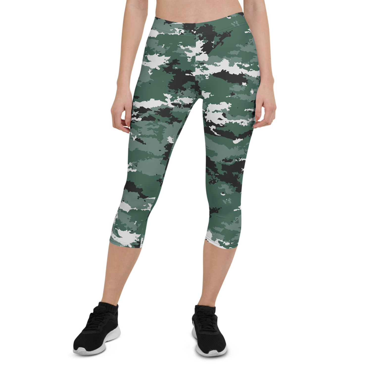 A pair of women's Earth Green Camo Capri Leggings featuring a unique camouflage design, perfect for workouts and casual wear.