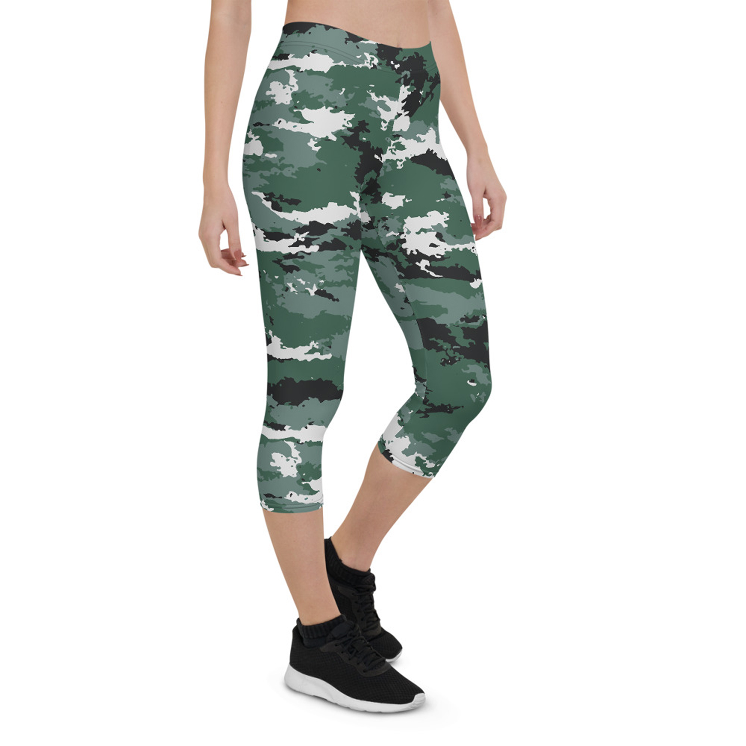 A pair of women's Earth Green Camo Capri Leggings featuring a unique camouflage design, perfect for workouts and casual wear.