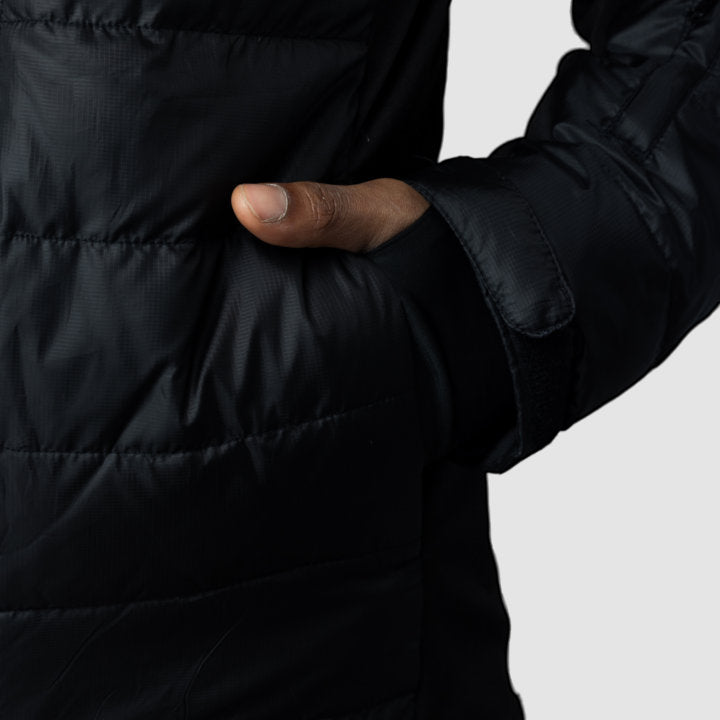 Men's EcoDown Jacket in black, made from recycled materials, featuring a lightweight design and built-in sleeve gloves.