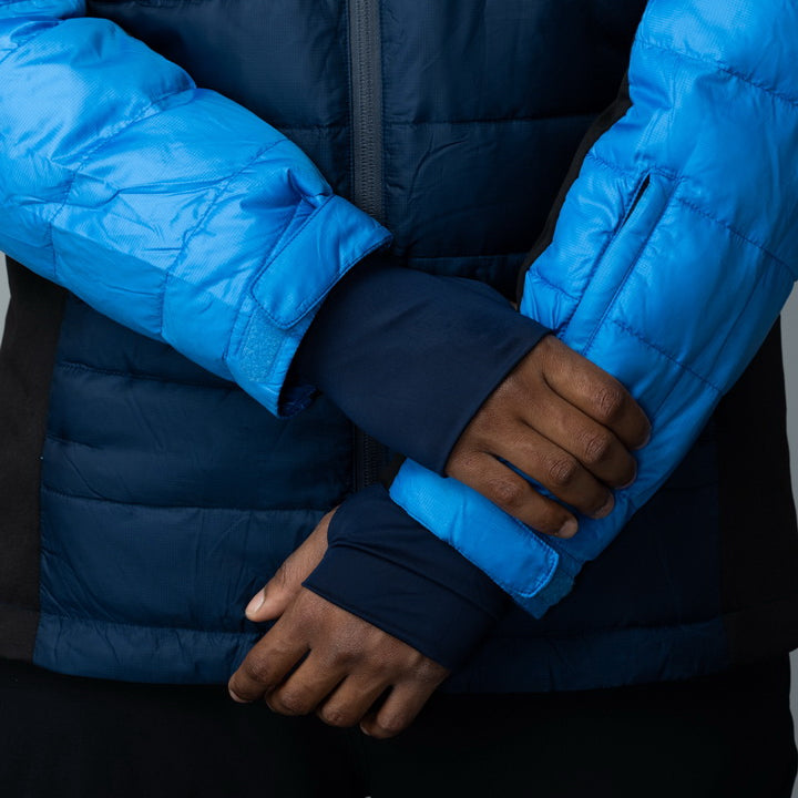 Men's EcoDown Jacket in blue, made from recycled materials, featuring a lightweight design and built-in sleeve gloves.