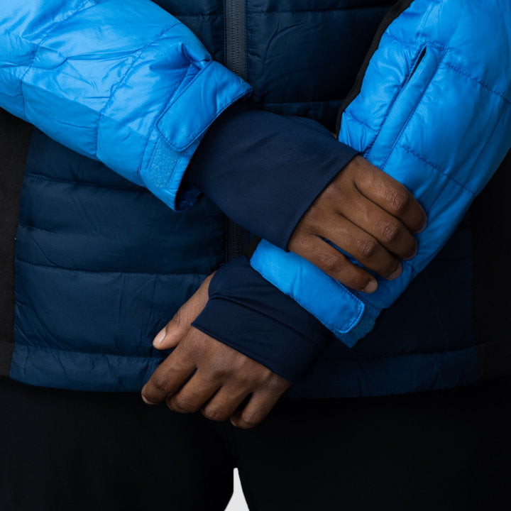 Men's EcoDown Jacket in blue, made from recycled materials, featuring a lightweight design and built-in sleeve gloves.