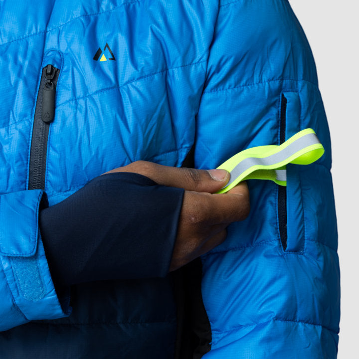 Men's EcoDown Jacket in blue, made from recycled materials, featuring a lightweight design and built-in sleeve gloves.