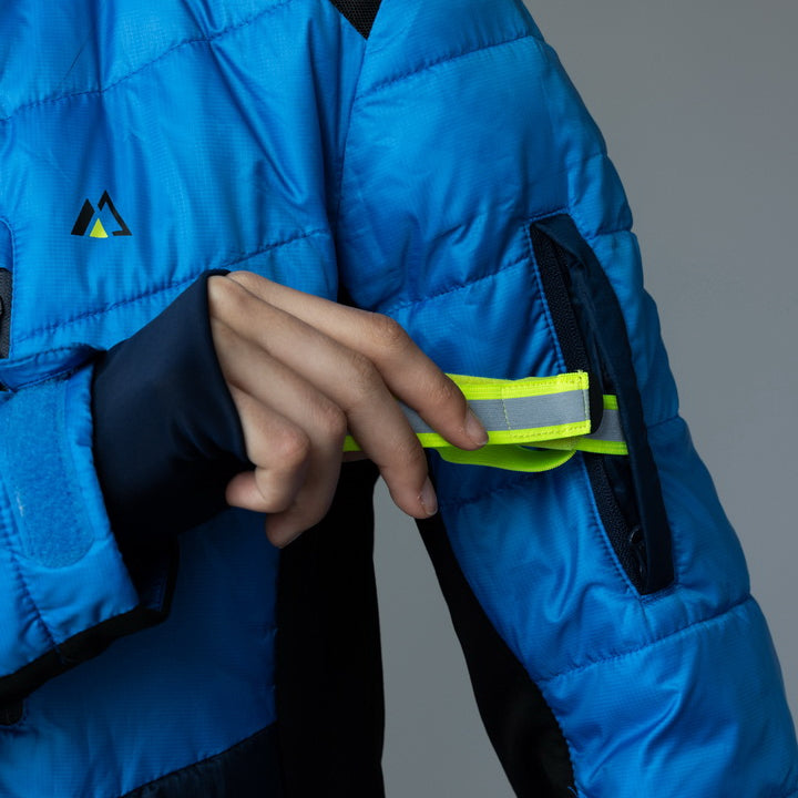 EcoDown Jacket for women in blue, featuring a lightweight design and built-in sleeve gloves for added warmth.