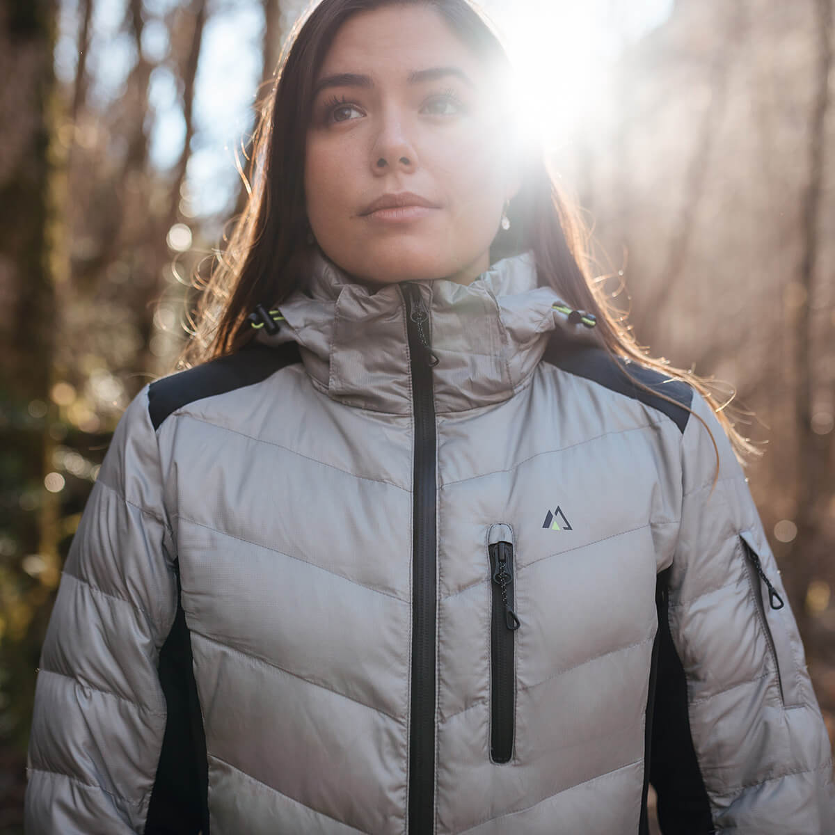 EcoDown Jacket for Women in Gray, featuring a lightweight design and built-in sleeve gloves, made from recycled materials.