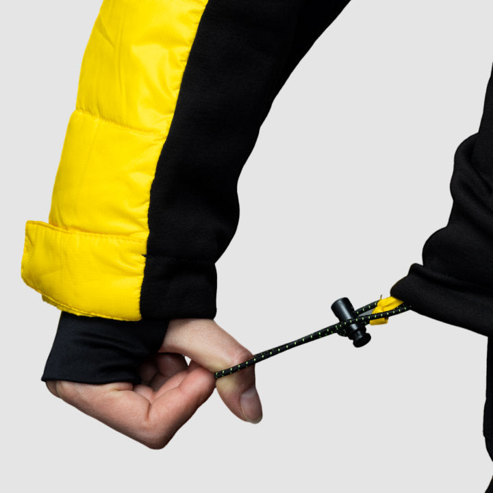 EcoDown Jacket for women in yellow, featuring a lightweight design, built-in sleeve gloves, and a water-repellent finish.