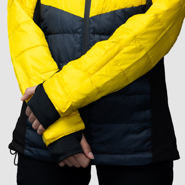 EcoDown Jacket for women in yellow, featuring a lightweight design, built-in sleeve gloves, and a water-repellent finish.