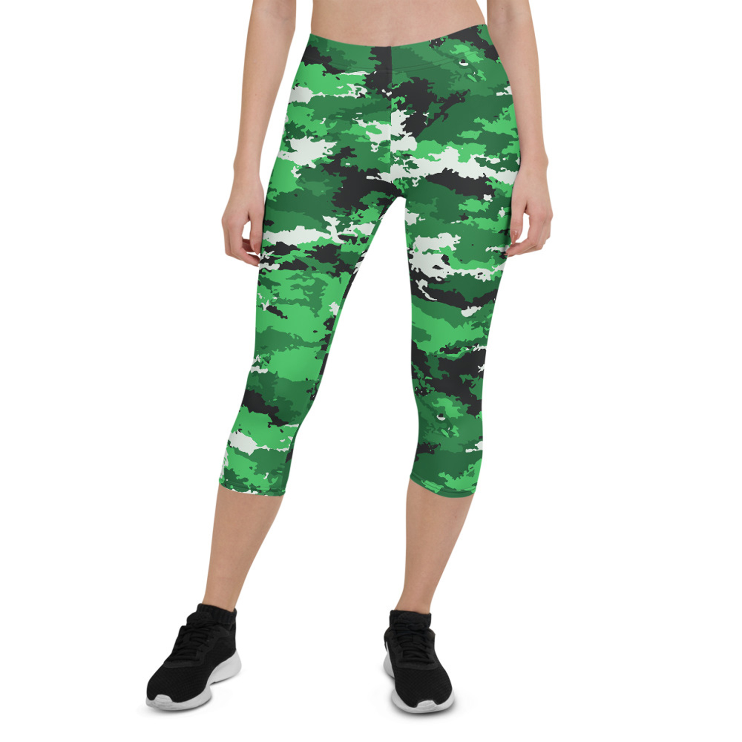 A pair of women's green camo capri leggings designed for performance and comfort, featuring a unique print and a snug fit suitable for various athletic activities.