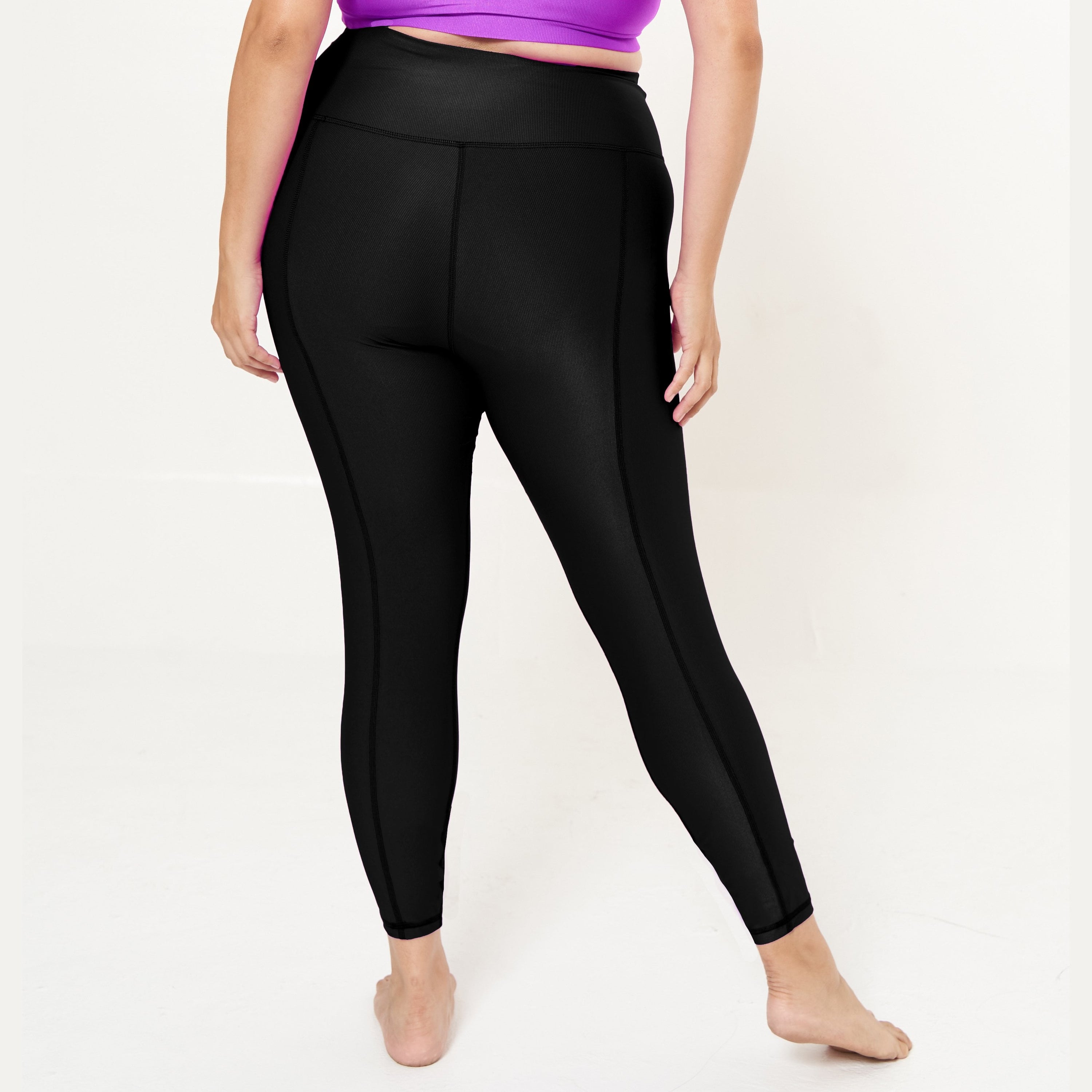 Hi-Rise Leggings in Black Rib Pattern, showcasing a stylish ribbed texture and high-rise design for comfort and support.