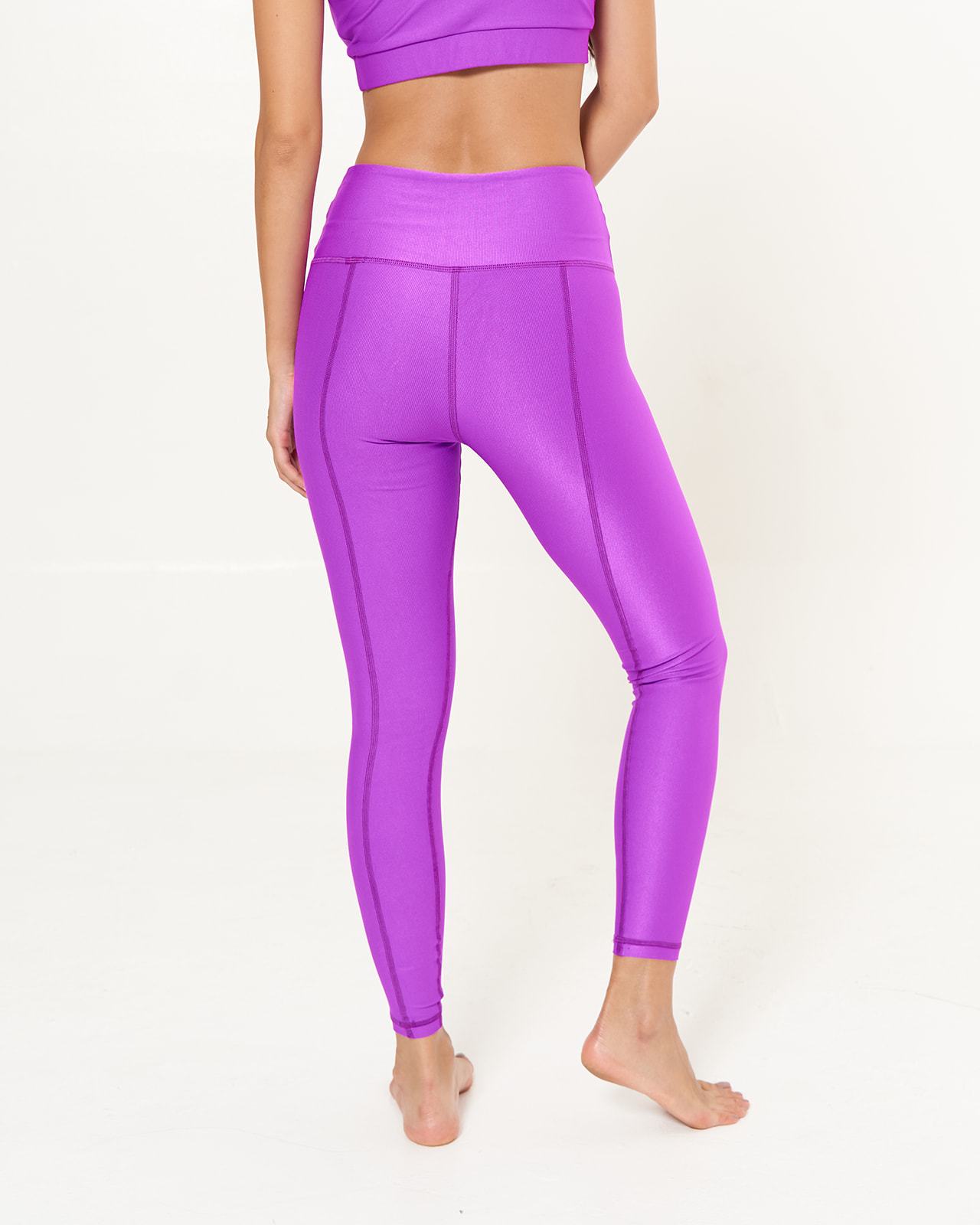 Hi-Rise Leggings in vibrant fuchsia rib pattern, showcasing a stylish and comfortable design for activewear.