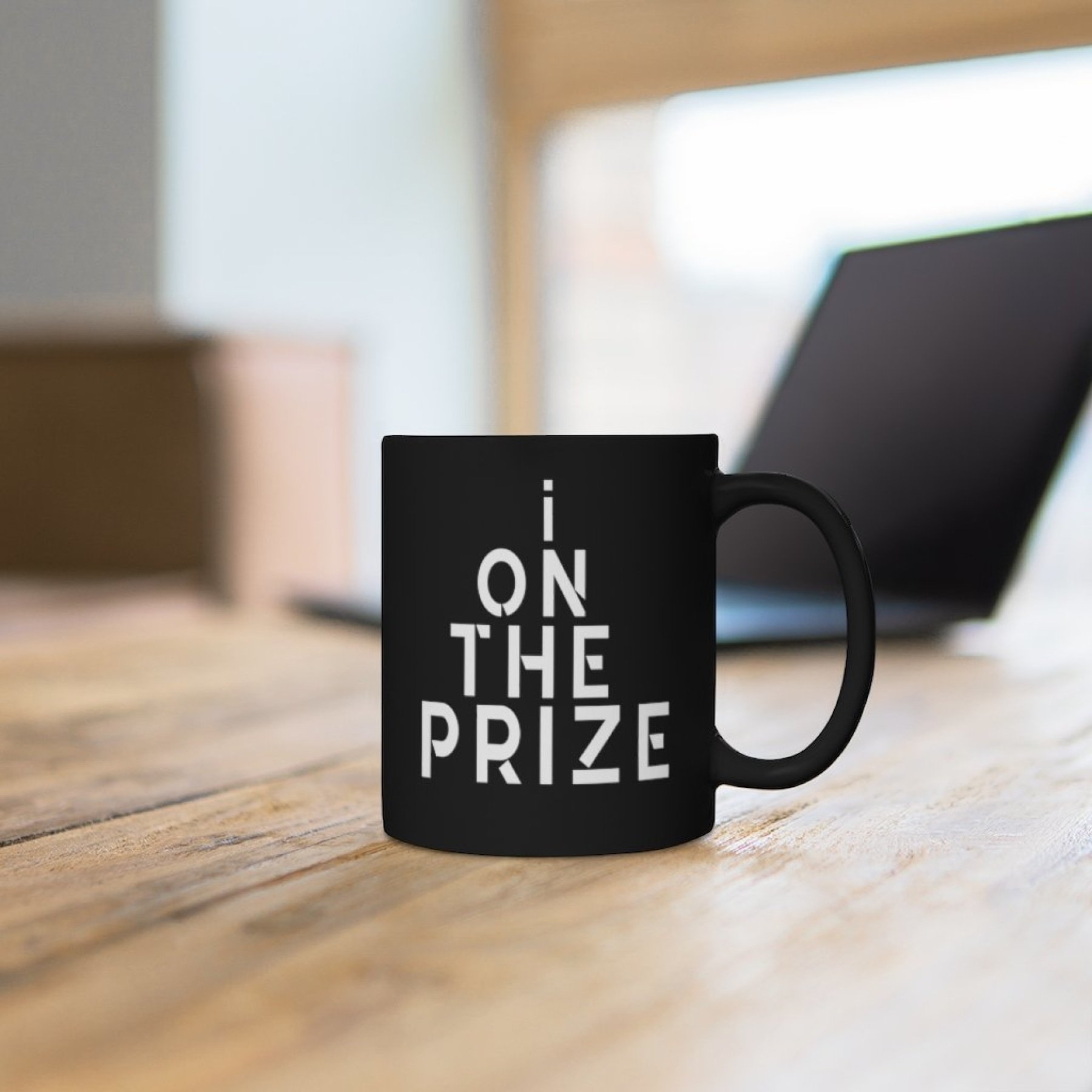 I On The Prize Black Mug 11Oz, featuring a sleek black ceramic design with rounded corners and a comfortable C-handle.