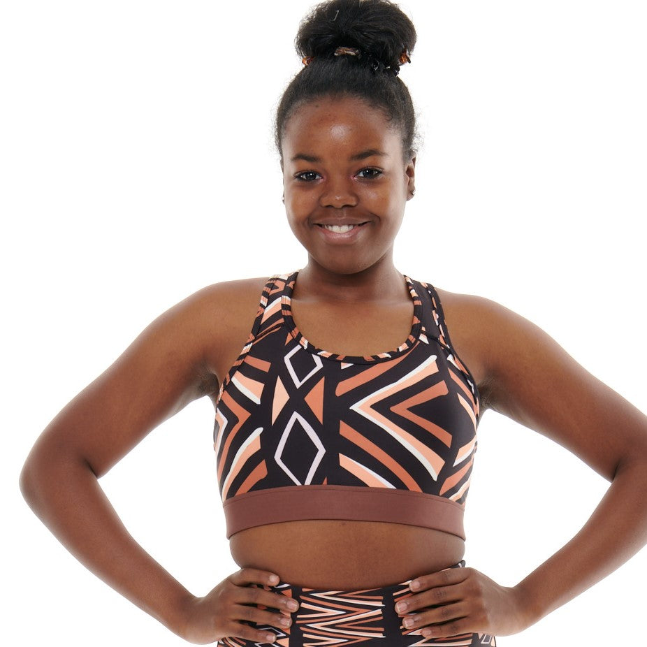 Ibeekay Sports Bra featuring Mud Cloth patterns and racer back design, ideal for activewear.