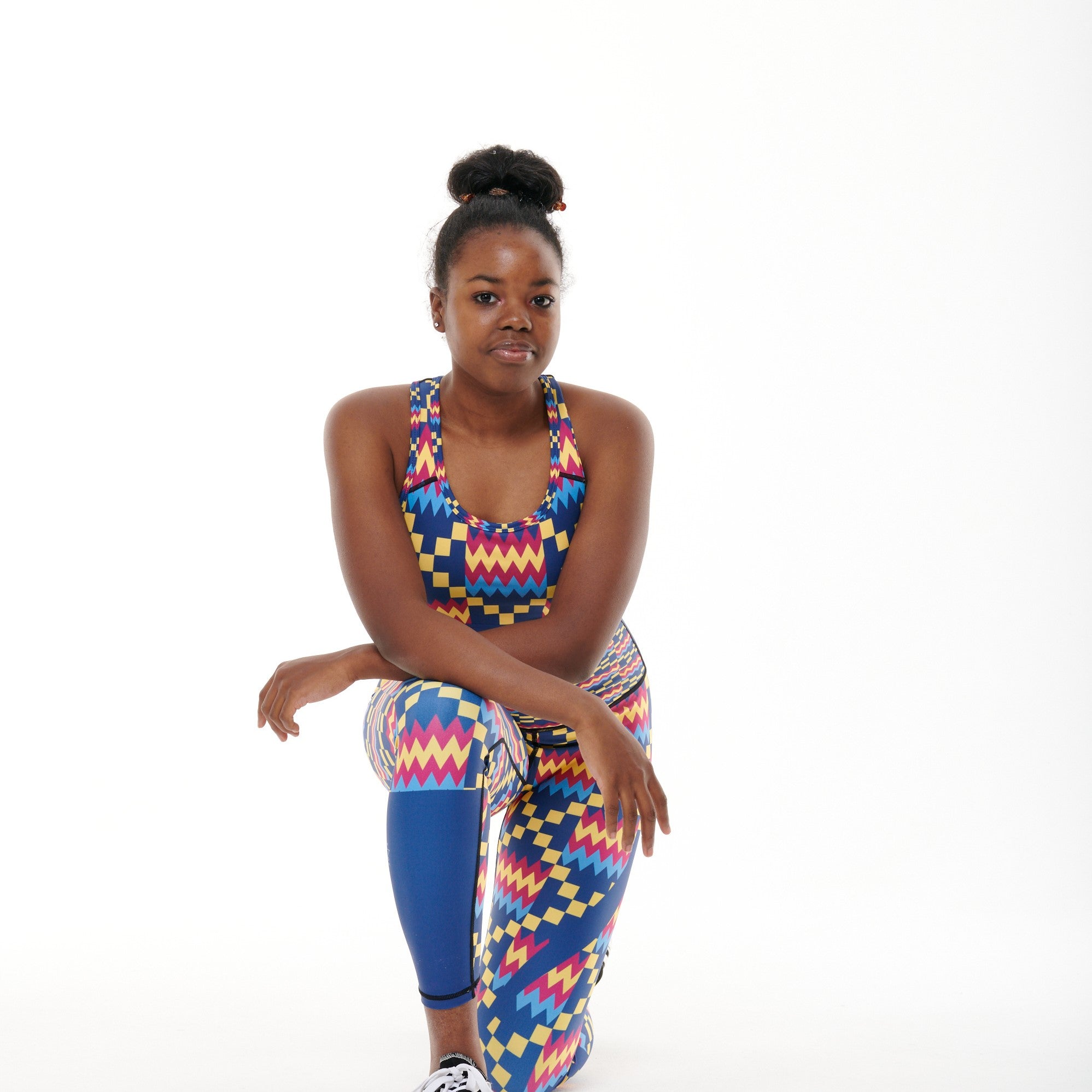 Kayentee Cerulean Vibrant Leggings featuring bold Cerulean Blue, Cerise, Black, and Yellow colors with a high stretch fabric and engineered waistband.