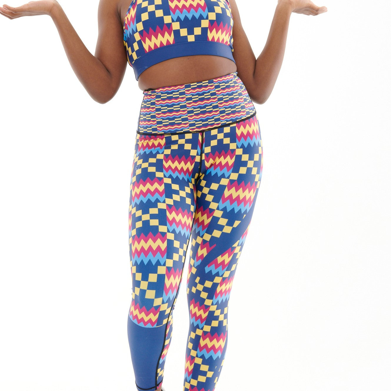 Kayentee Cerulean Vibrant Leggings featuring bold Cerulean Blue, Cerise, Black, and Yellow colors with a high stretch fabric and engineered waistband.