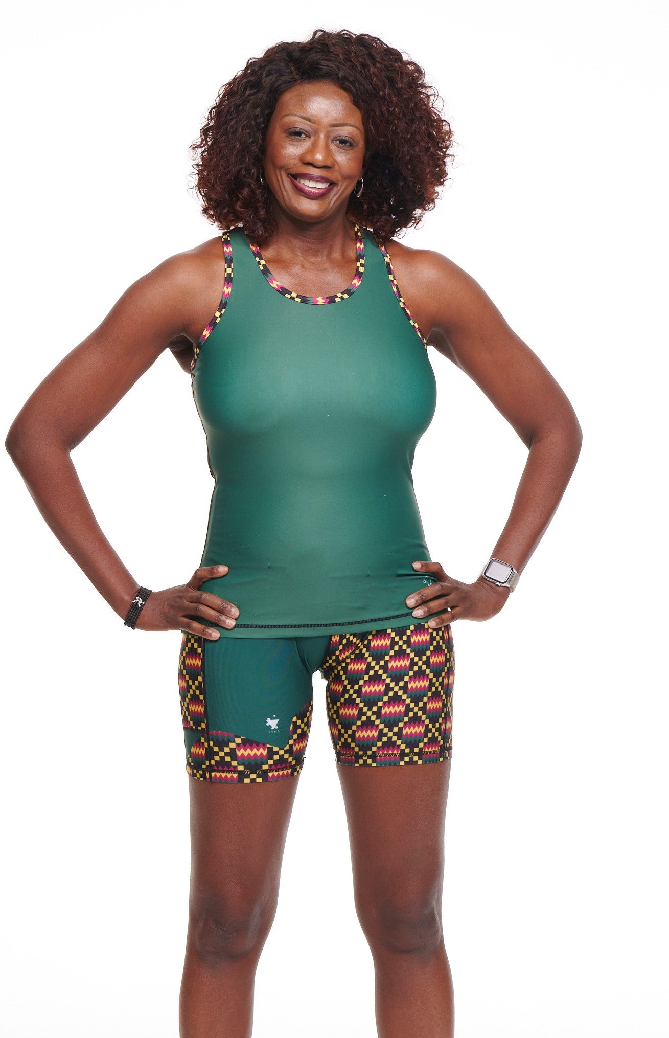 Kayentee High Rise Biker Shorts featuring a vibrant Kente pattern, high waist design, and side pocket for phone storage.