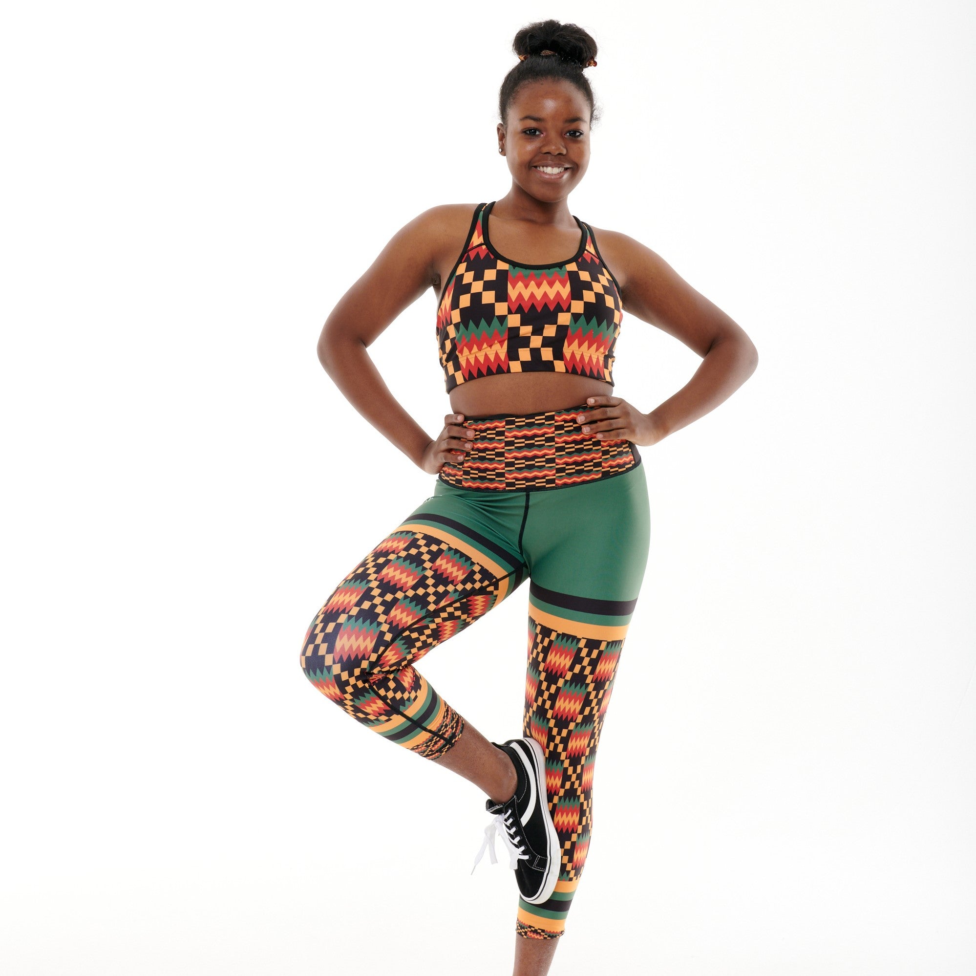 Kayentee On Green Funky Leggings featuring a bold geometric pattern with green color-blocking, designed for comfort and functionality.