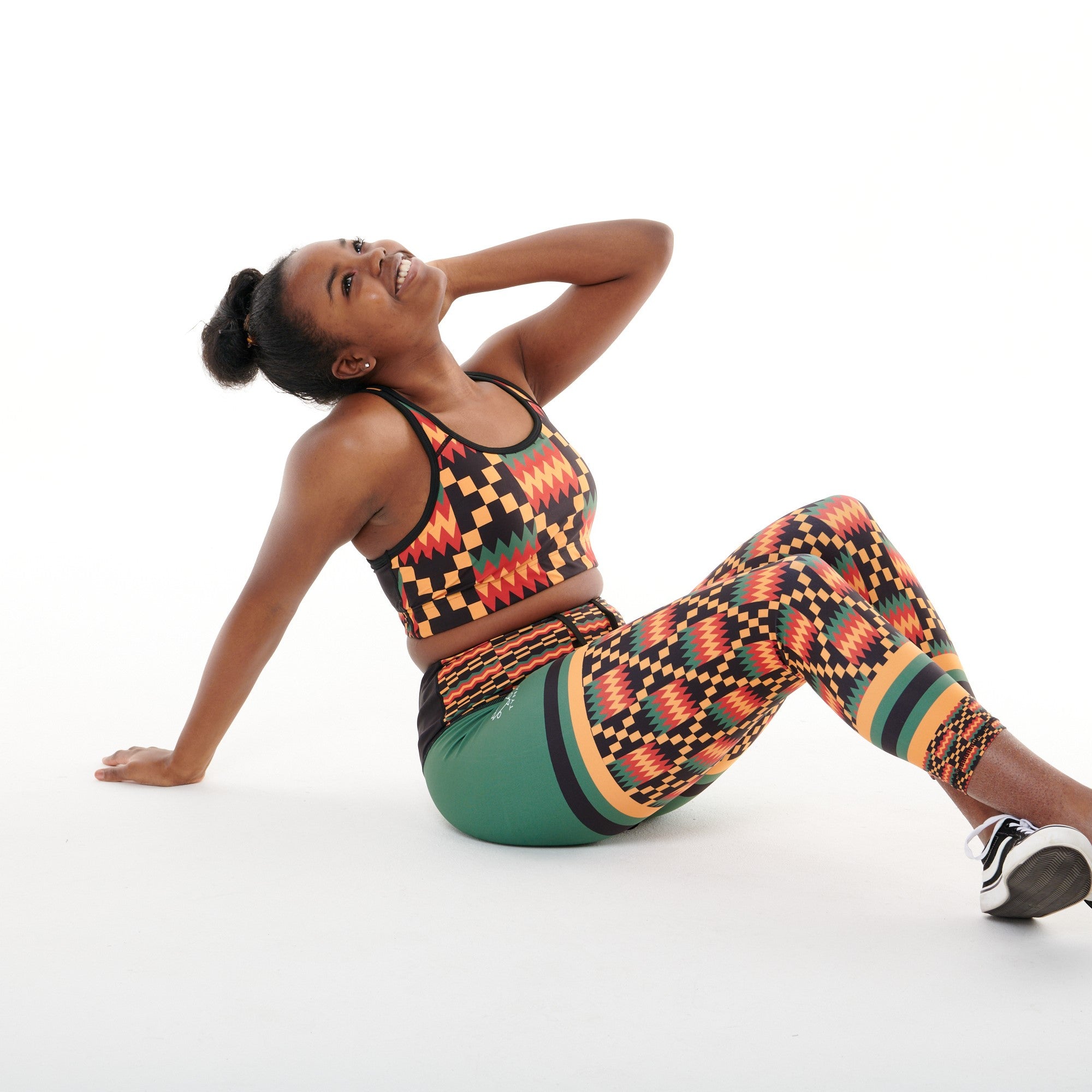 Kayentee On Green Funky Leggings featuring a bold geometric pattern with green color-blocking, designed for comfort and functionality.