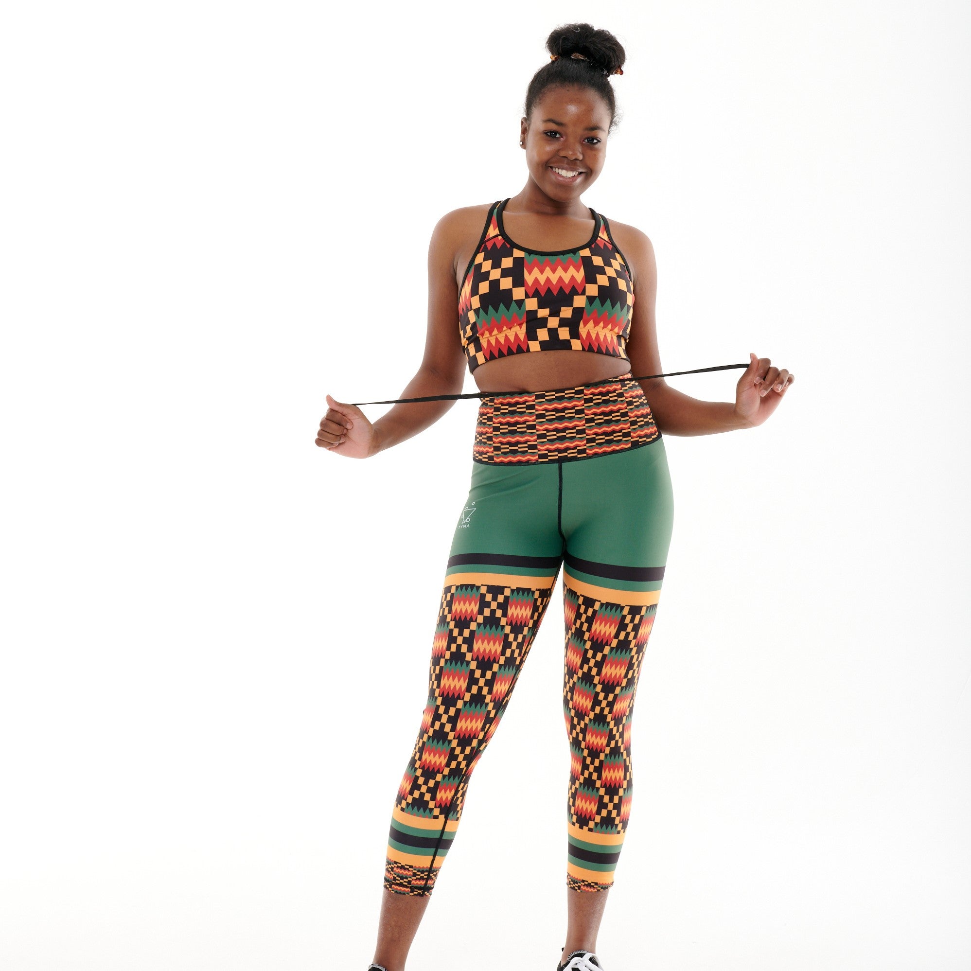 Kayentee On Green Funky Leggings featuring a bold geometric pattern with green color-blocking, designed for comfort and functionality.