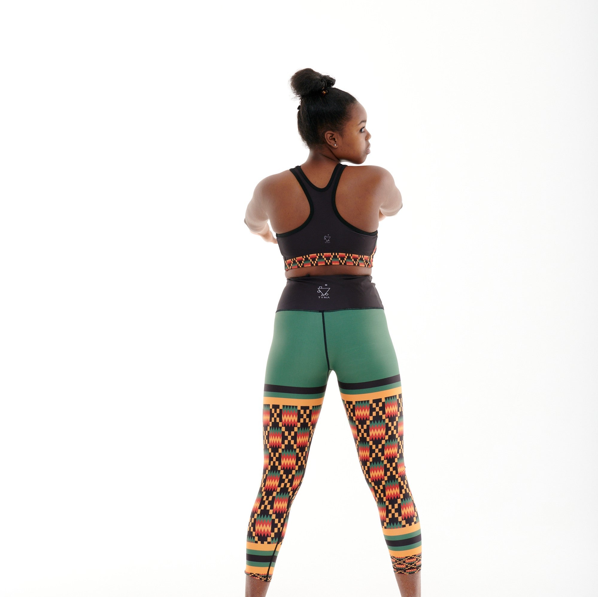 Kayentee On Green Funky Leggings featuring a bold geometric pattern with green color-blocking, designed for comfort and functionality.