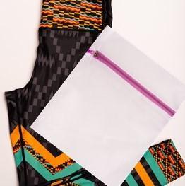 Kayentee Splash Leggings featuring vibrant geometric patterns in black, green, saffron, and flame colors, designed for comfort and style.