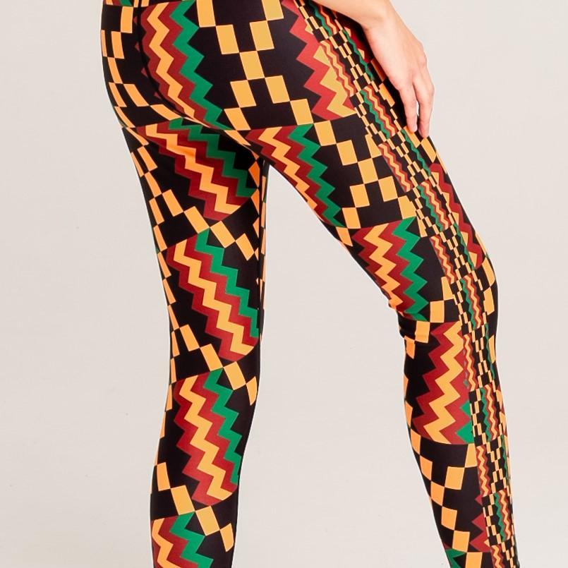 Kayentee Vibrant Leggings featuring bold geometric Kente cloth pattern in black, green, saffron, and flame colors, designed for comfort and performance.