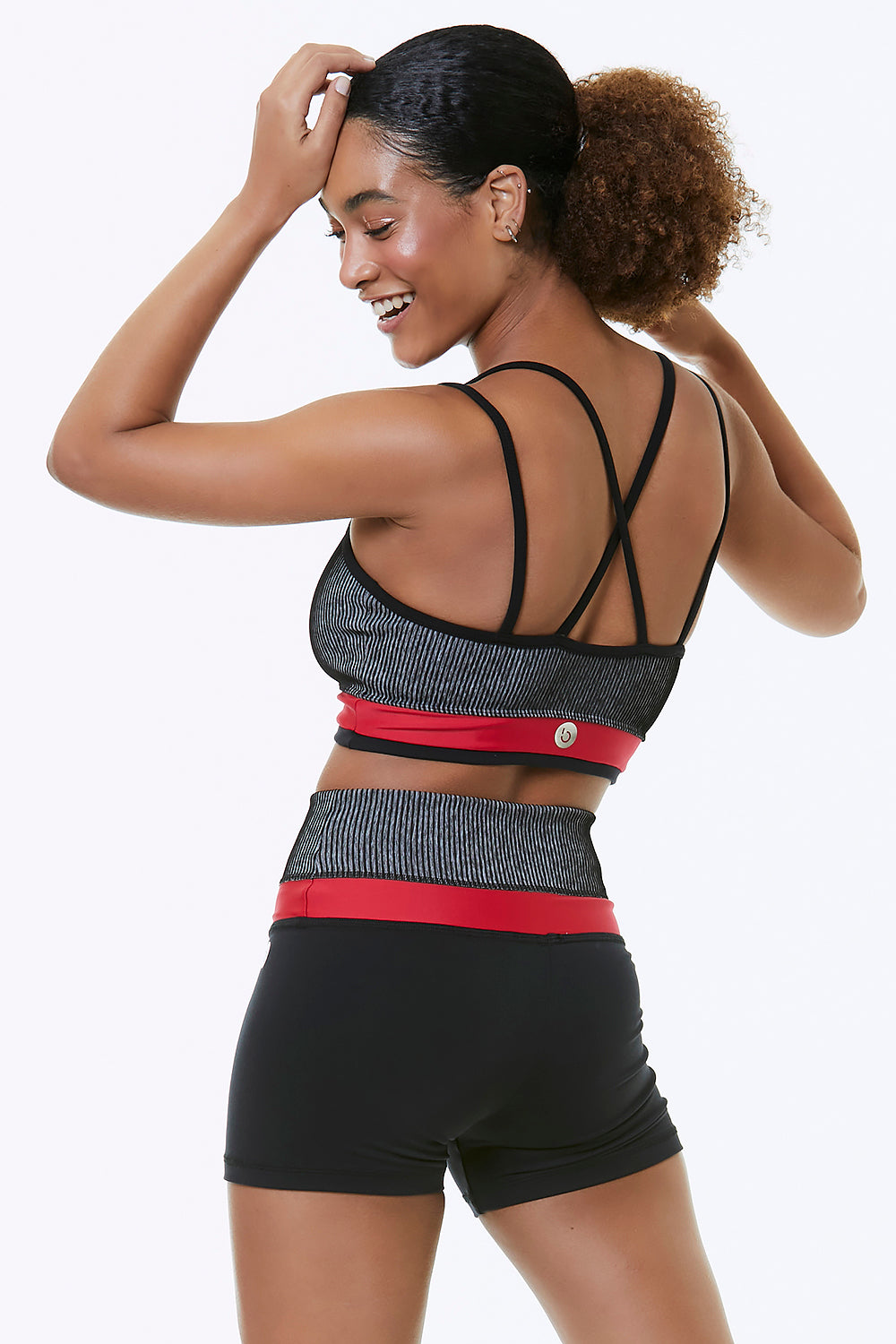 MADRAS SPORTS BRA featuring double slim straps and criss-cross back design, made from breathable Supplex fabric.