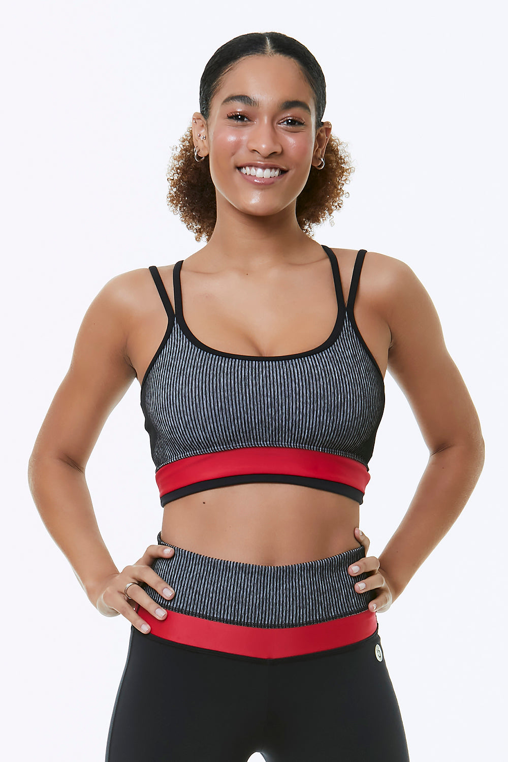 MADRAS SPORTS BRA featuring double slim straps and criss-cross back design, made from breathable Supplex fabric.