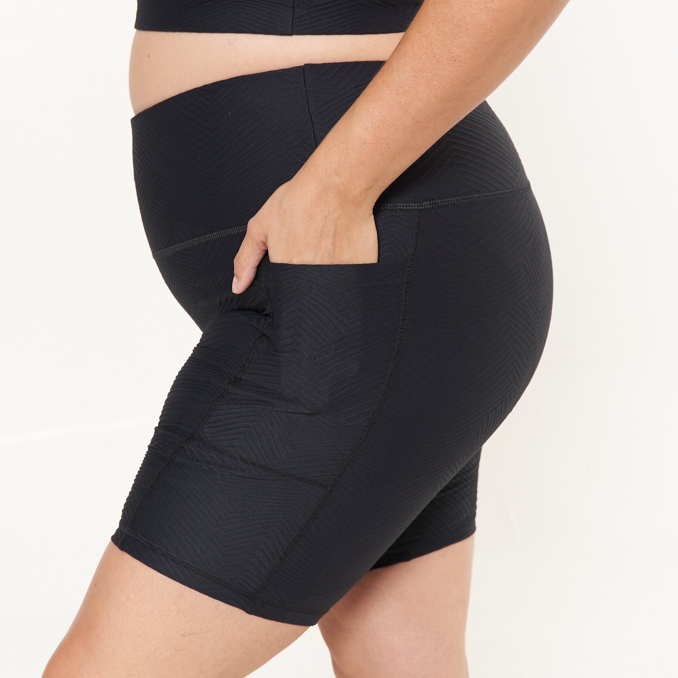 Lola Getts® Pocket Biker Shorts in black ridges pattern, showcasing a stylish and functional design with a convenient pocket.