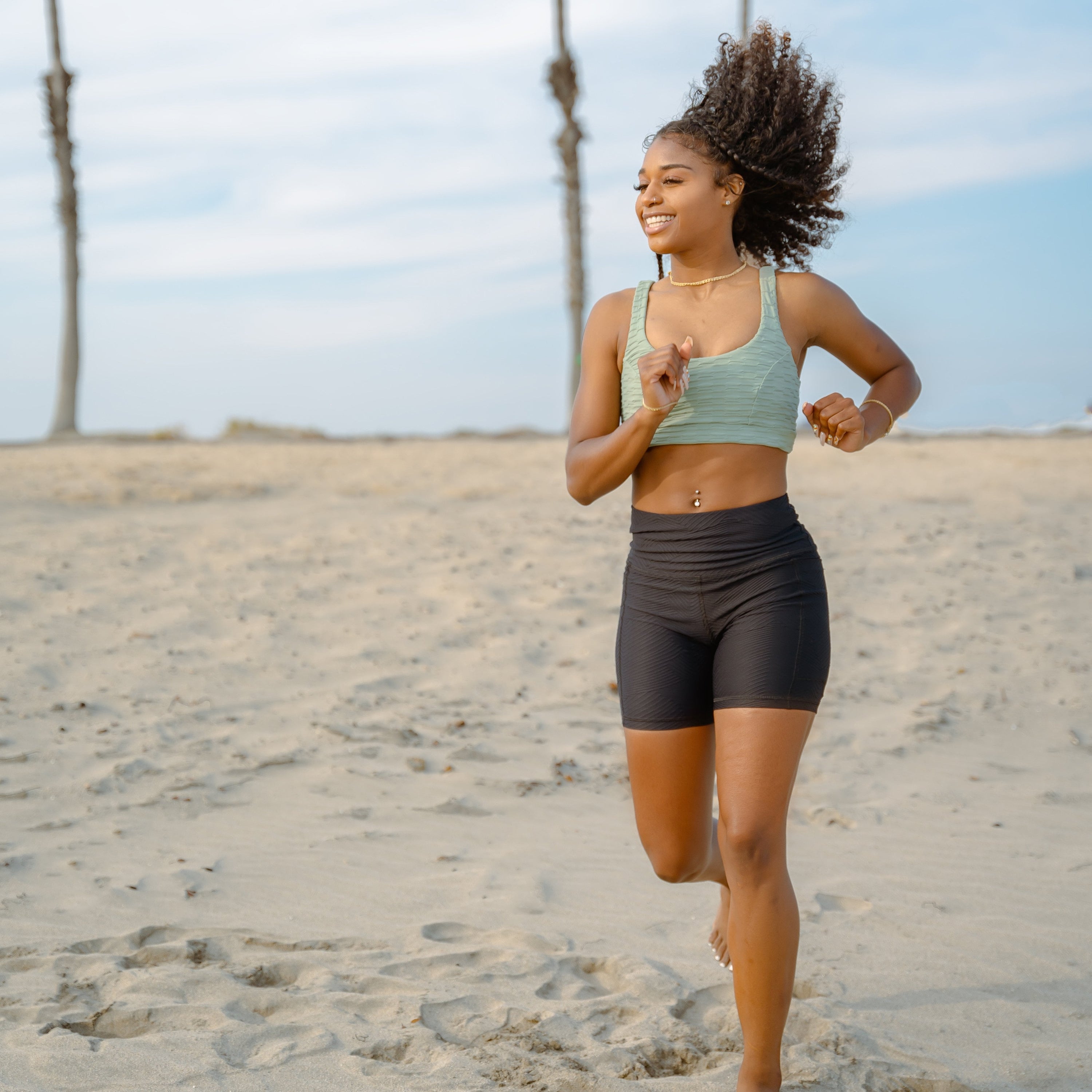 Lola Getts® Pocket Biker Shorts in black ridges pattern, showcasing a stylish and functional design with a convenient pocket.