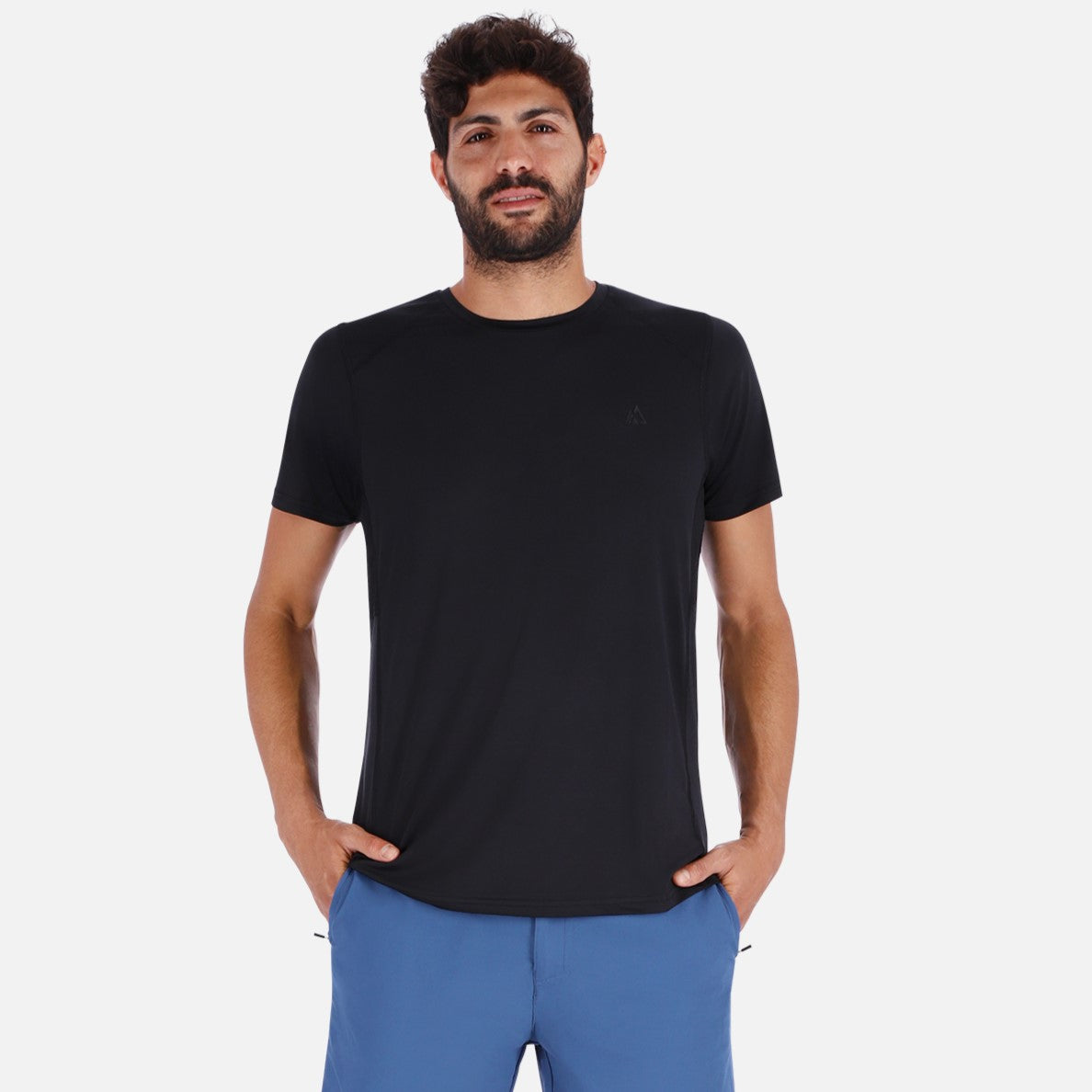 A sleek black QuickDry shirt featuring a unique ventilation system, designed for outdoor activities with moisture-wicking technology.