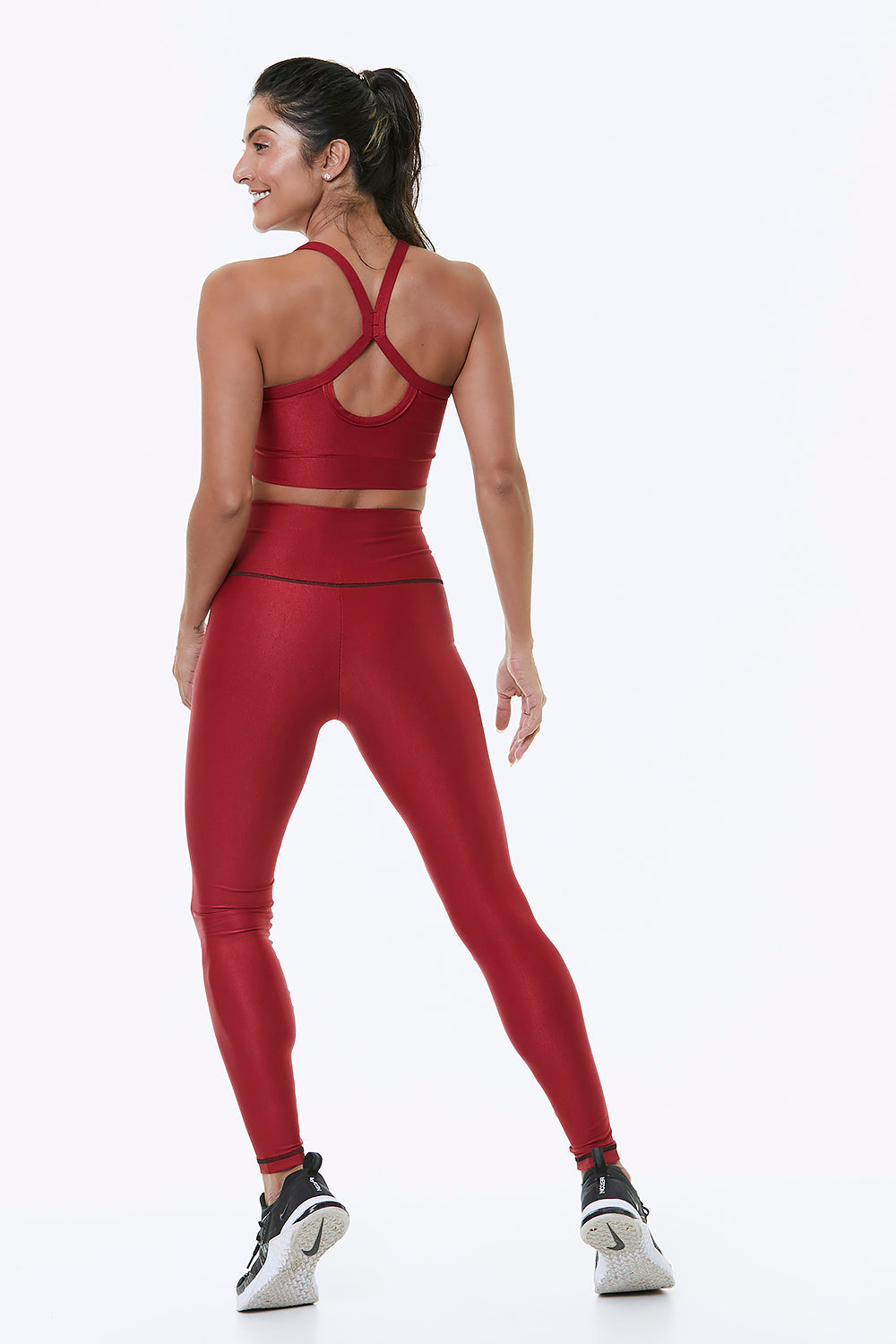 A pair of stylish RED ATACAMA LEGGING showcasing luxurious 4-way stretch ribbed fabric, designed for comfort and support.