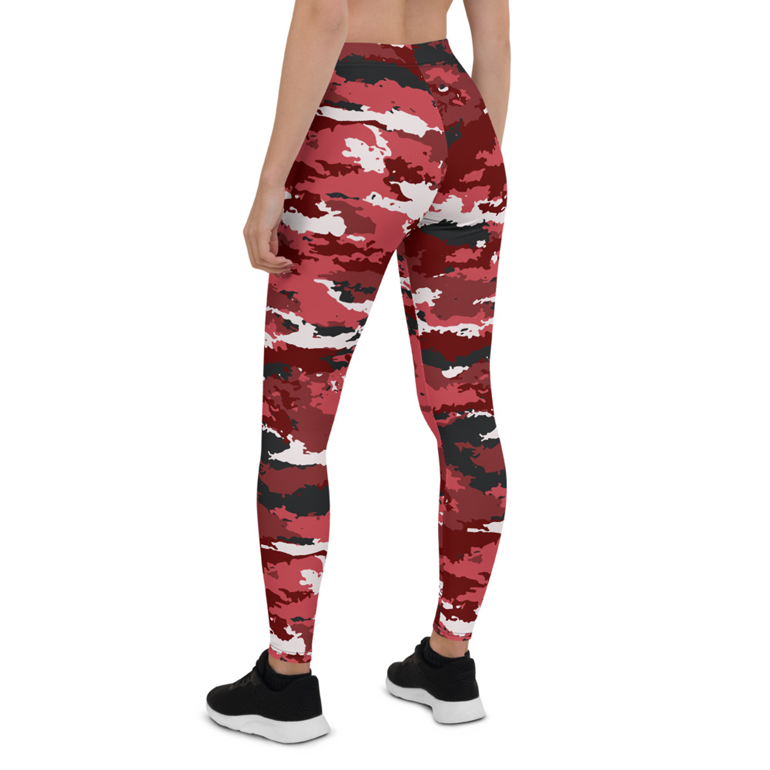 A pair of stylish red camo leggings for women, showcasing a unique graphic design, perfect for workouts and casual wear.