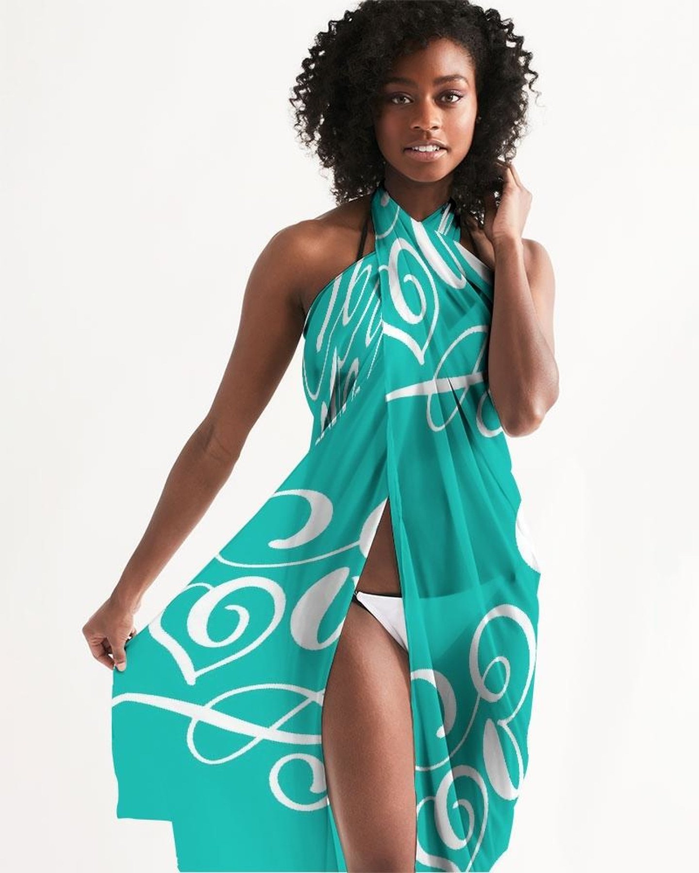 A lightweight green swimsuit cover up dress with a flowing design and self-tie closure, perfect for beach or pool outings.