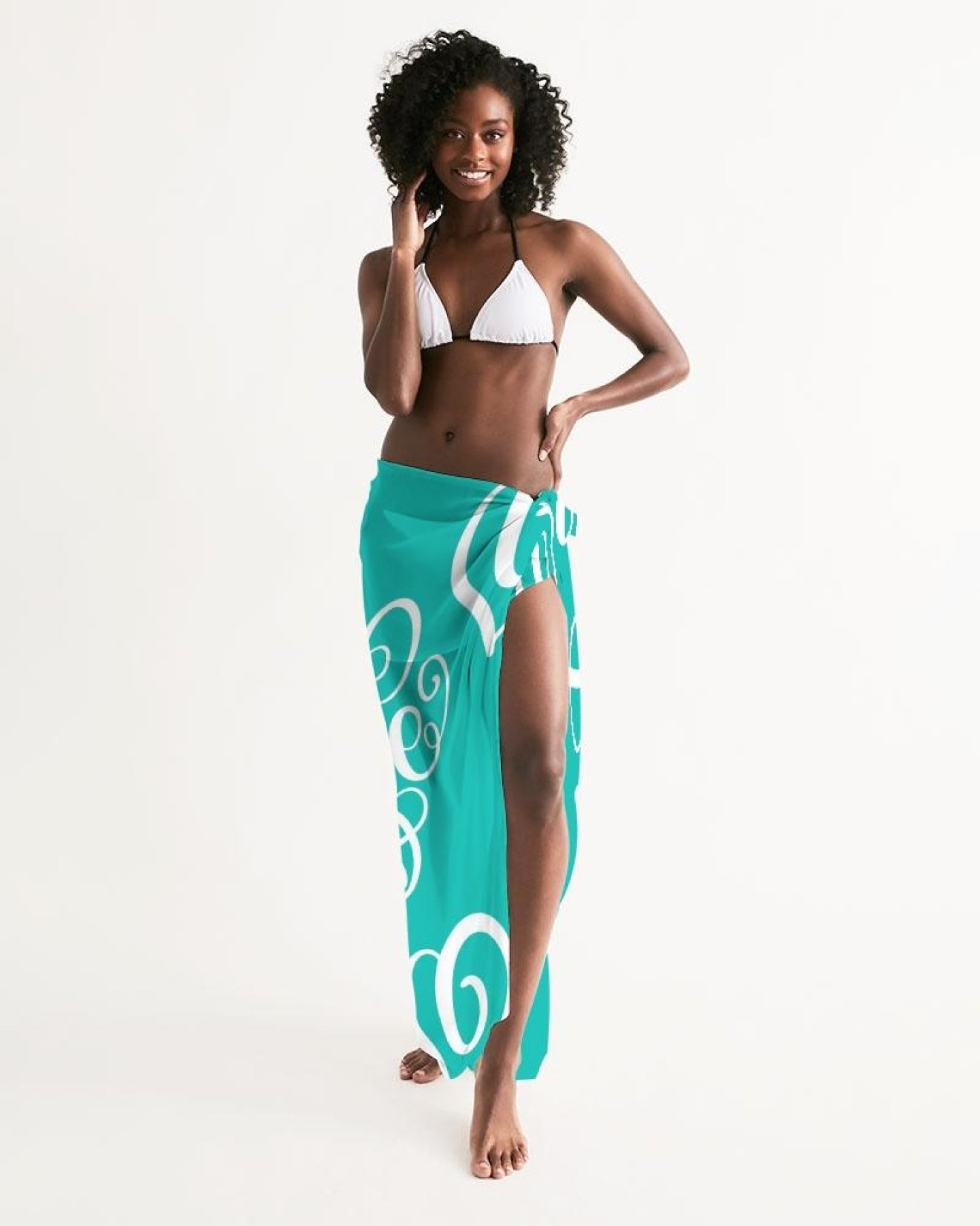 A lightweight green swimsuit cover up dress with a flowing design and self-tie closure, perfect for beach or pool outings.