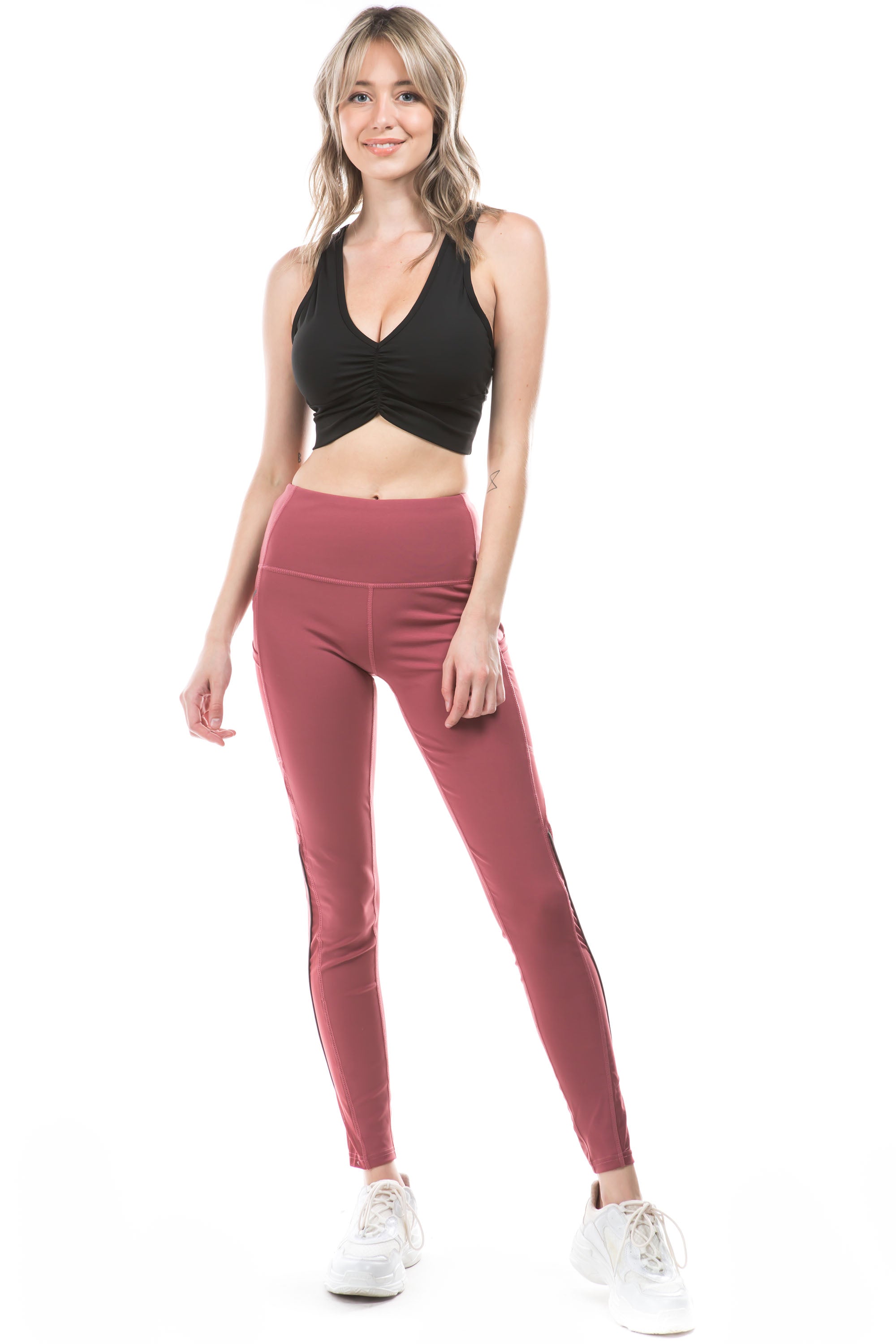 A pair of stylish Side Stripped Active Leggings featuring a comfortable fit and trendy side stripes, perfect for workouts and casual wear.