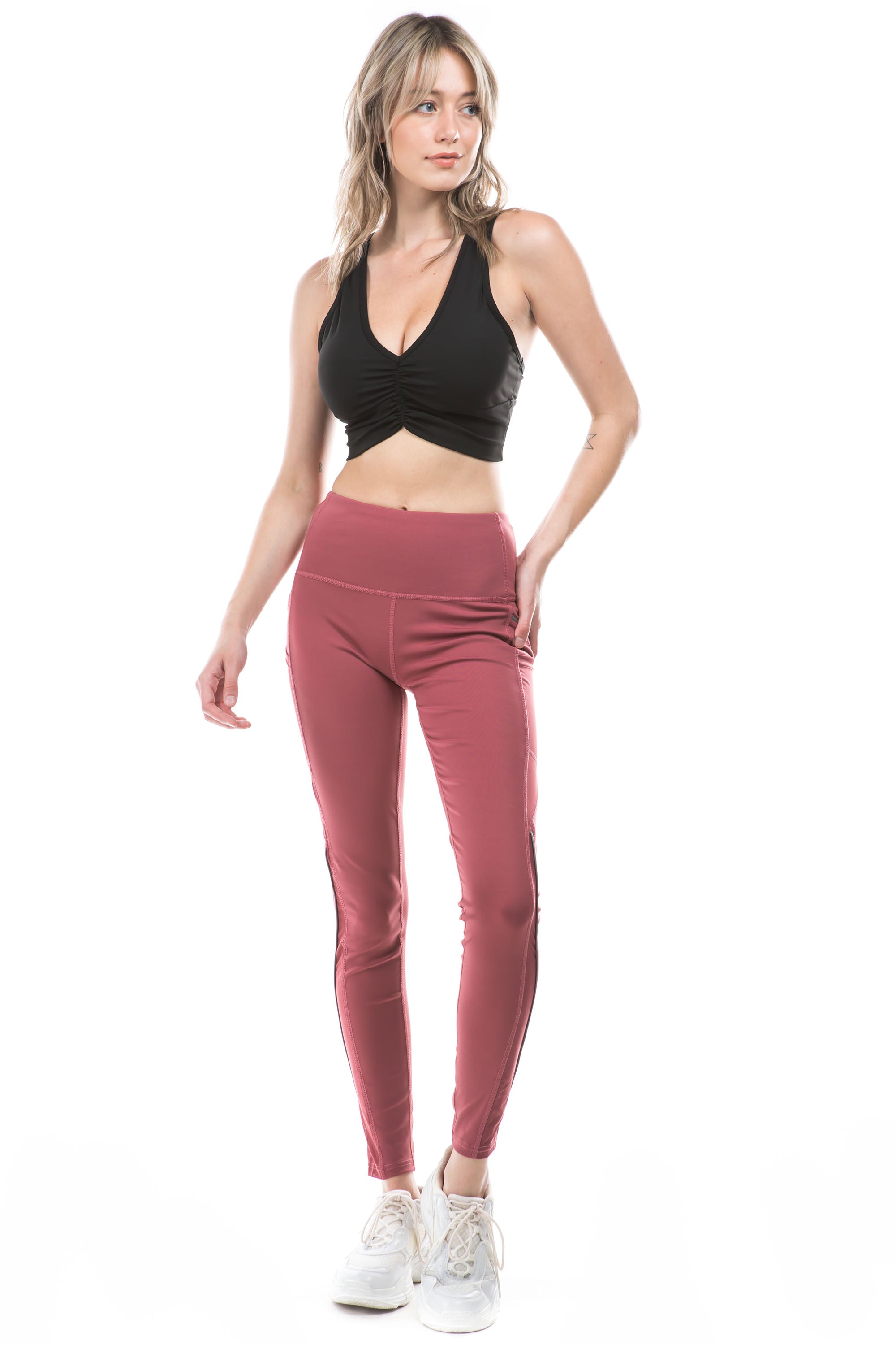 A pair of stylish Side Stripped Active Leggings featuring a comfortable fit and trendy side stripes, perfect for workouts and casual wear.