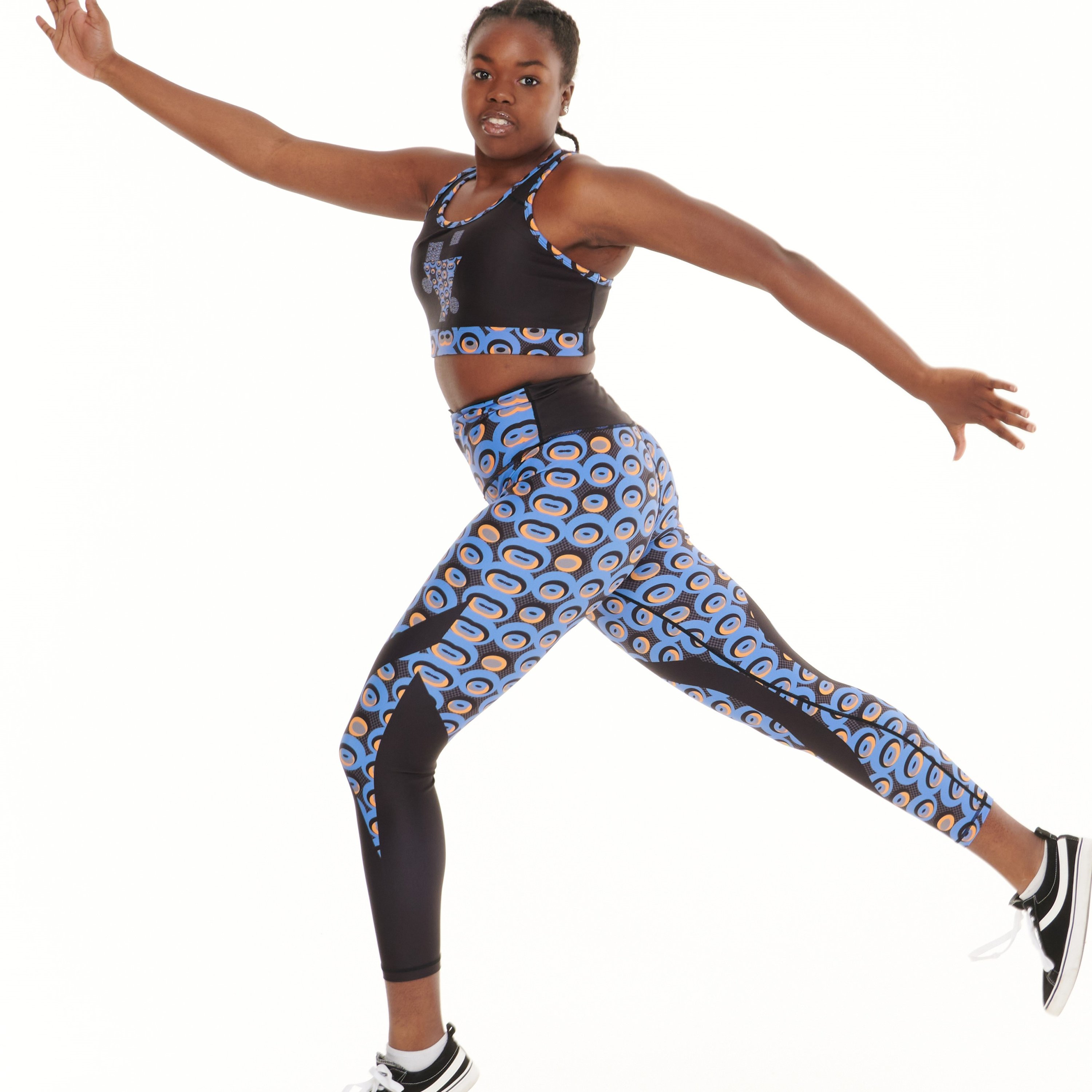 Siefay On Blue Vibrant Leggings featuring Ankara-inspired patterns and vibrant colors, perfect for activewear.