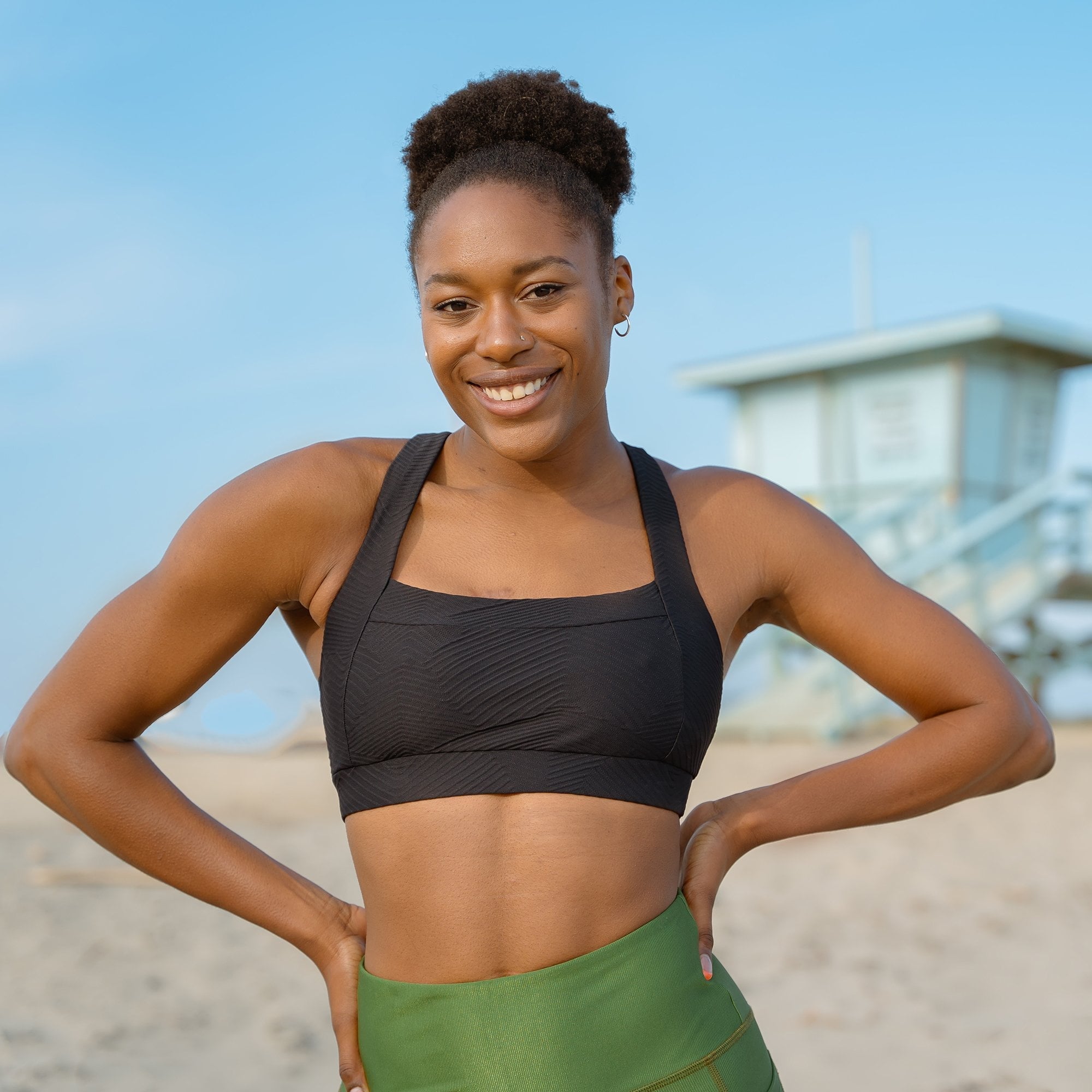 Lola Getts Square Neck Performance Bra Top in black ridges pattern, showcasing its stylish design and supportive features.