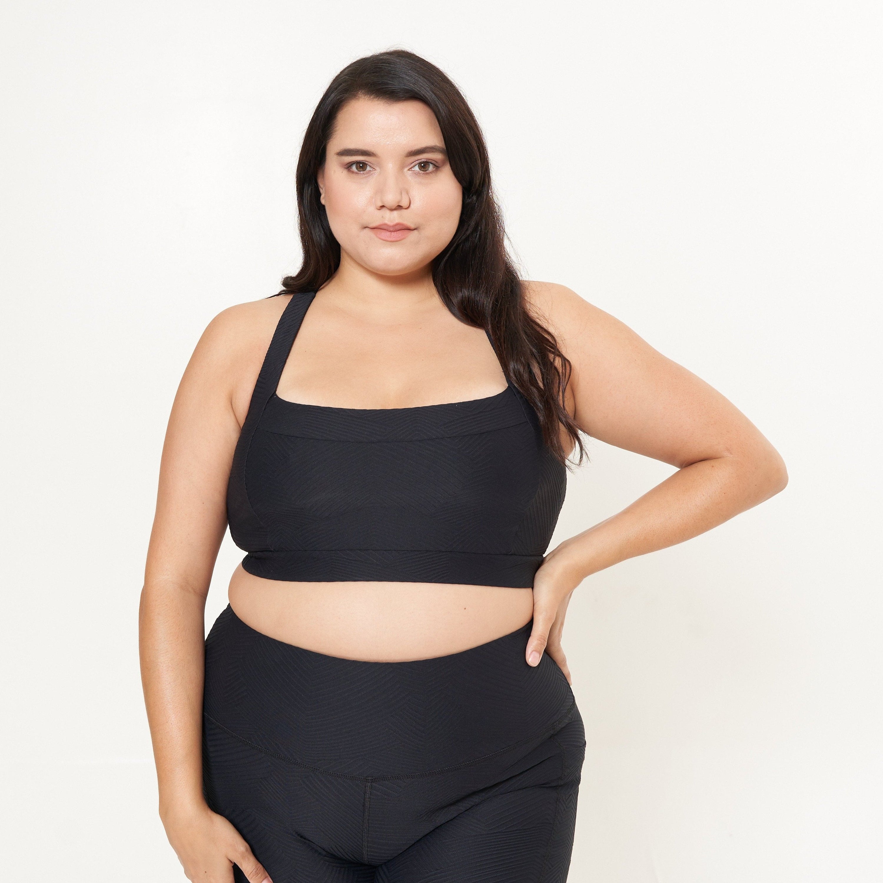 Lola Getts Square Neck Performance Bra Top in black ridges pattern, showcasing its stylish design and supportive features.