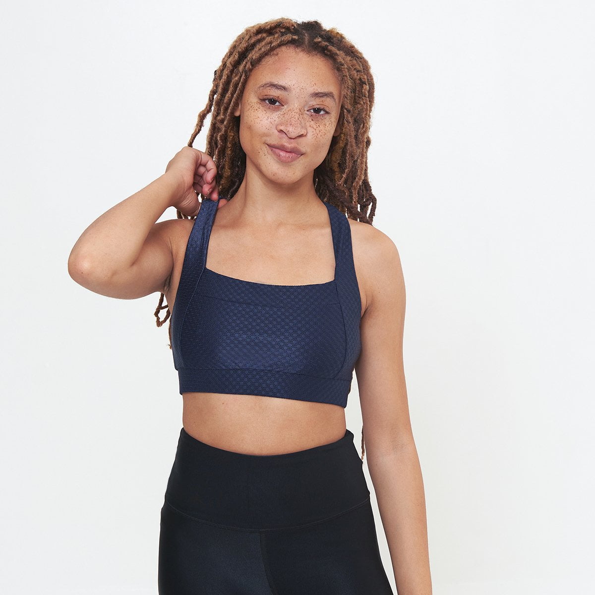 Square Neck Performance Bralette in Midnight Circles Pattern, showcasing stylish design and supportive features for workouts.