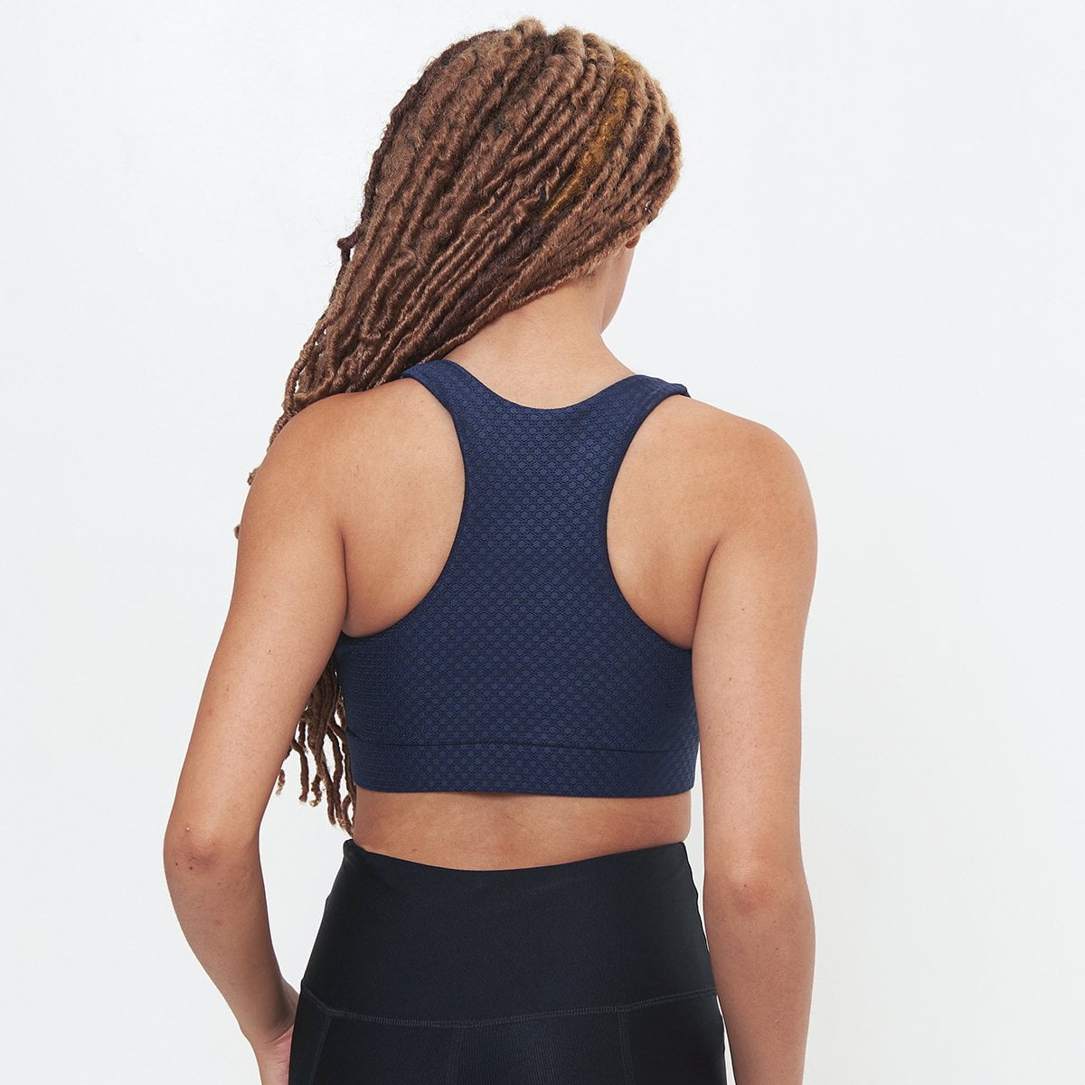 Square Neck Performance Bralette in Midnight Circles Pattern, showcasing stylish design and supportive features for workouts.