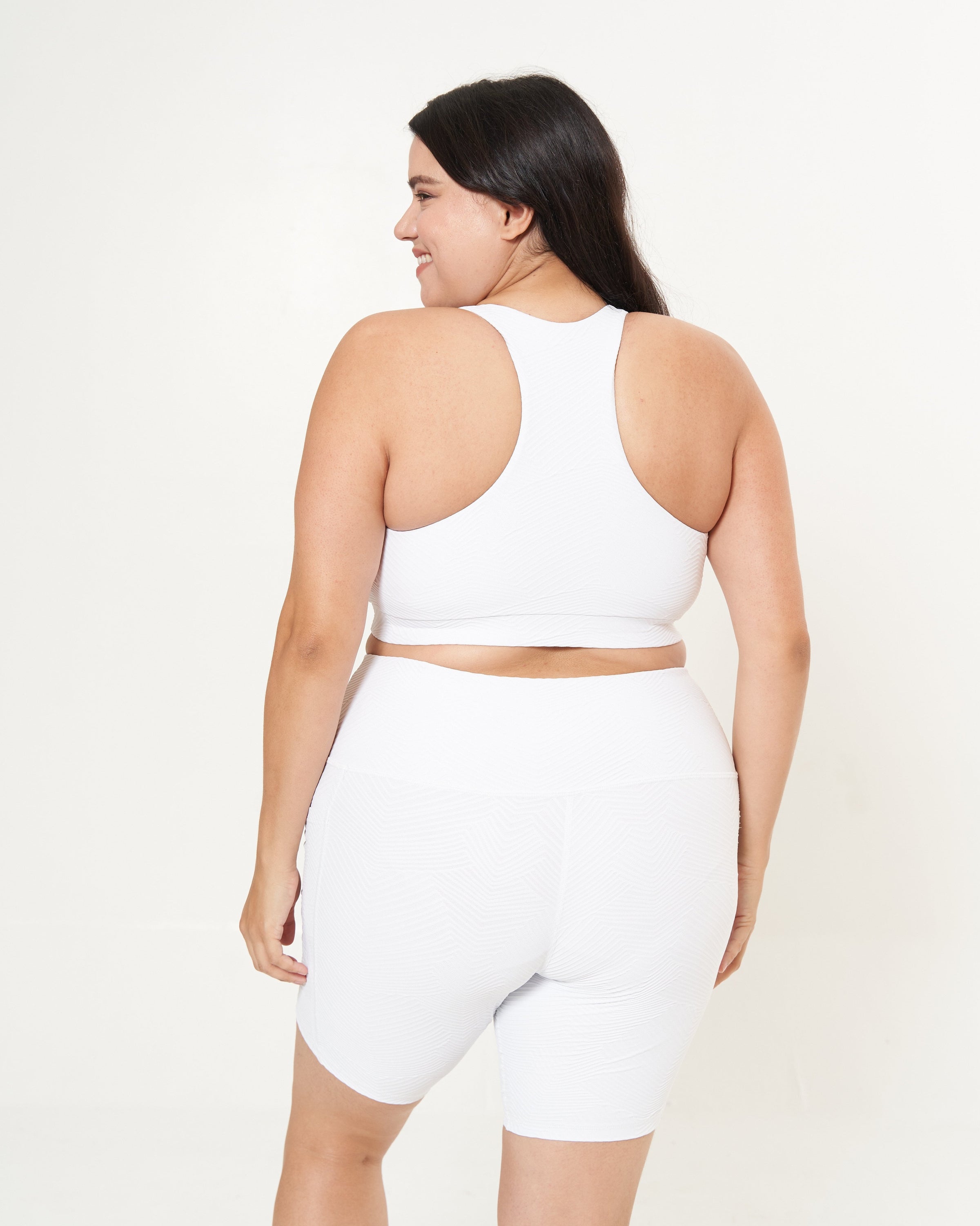 Lola Getts Square Neck Performance Bralette in white ridges pattern, designed for medium-impact workouts with a stylish and supportive fit.