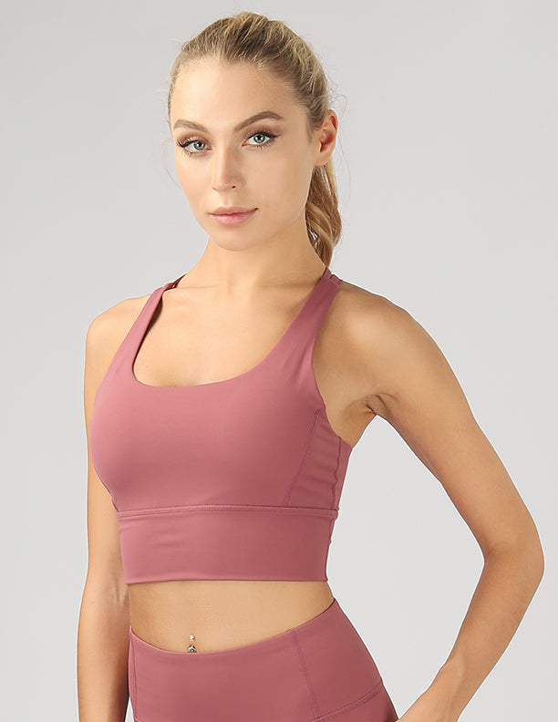 Strappy Back Active Crop Top featuring crisscross straps and breathable fabric, perfect for workouts.