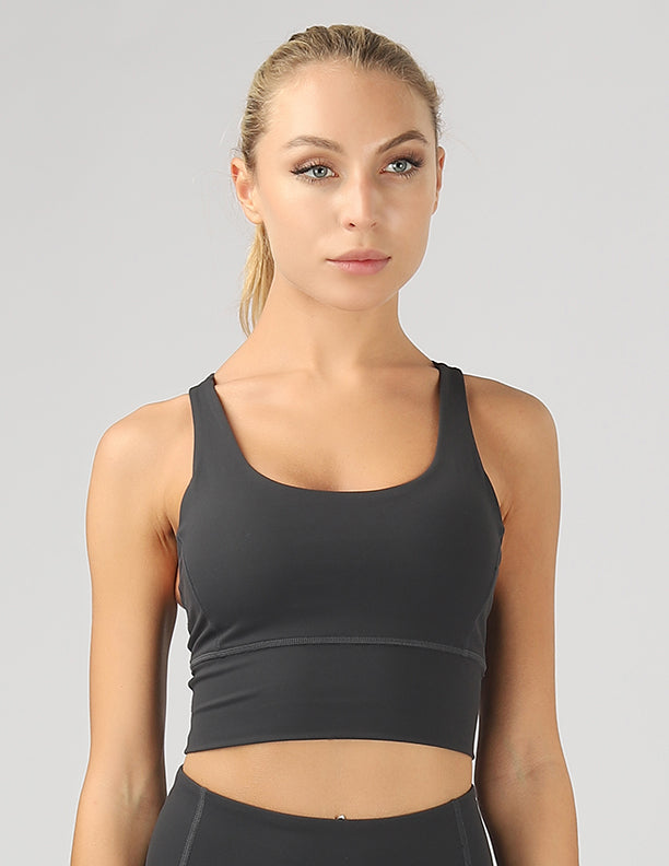 Strappy Back Active Crop Top featuring crisscross straps and breathable fabric, perfect for workouts.