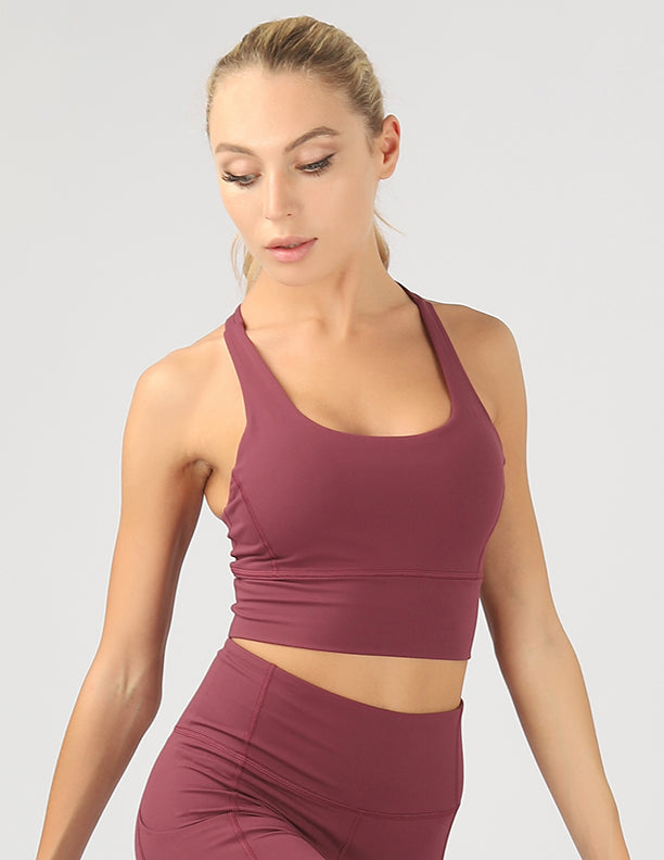 Strappy Back Active Crop Top featuring crisscross straps and breathable fabric, perfect for workouts.