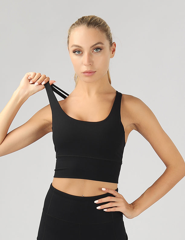 Strappy Back Active Crop Top featuring crisscross straps and breathable fabric, perfect for workouts.