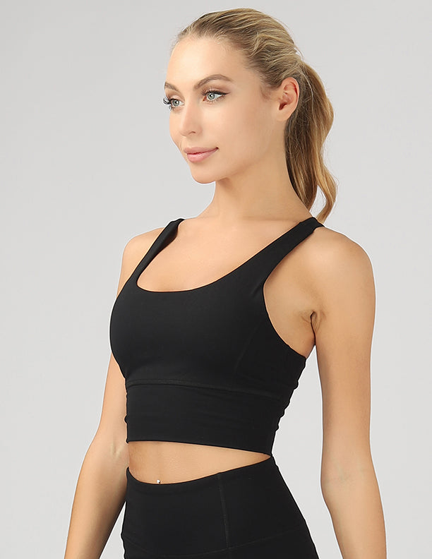 Strappy Back Active Crop Top featuring crisscross straps and breathable fabric, perfect for workouts.