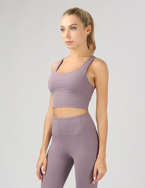 Strappy Back Active Crop Top featuring crisscross straps and breathable fabric, perfect for workouts.