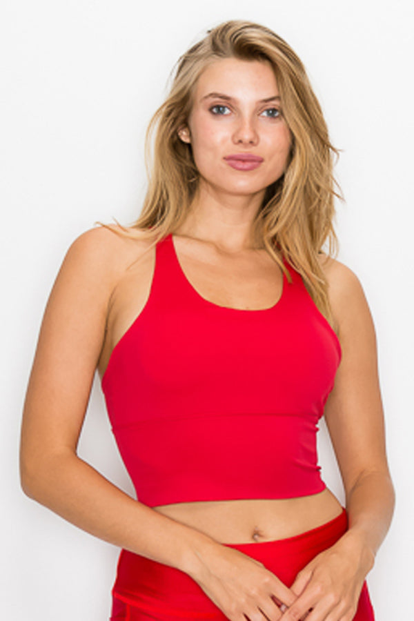 A stylish Strappy Back Crop Top featuring a trendy strappy back and corset tie at the waist, perfect for active wear.