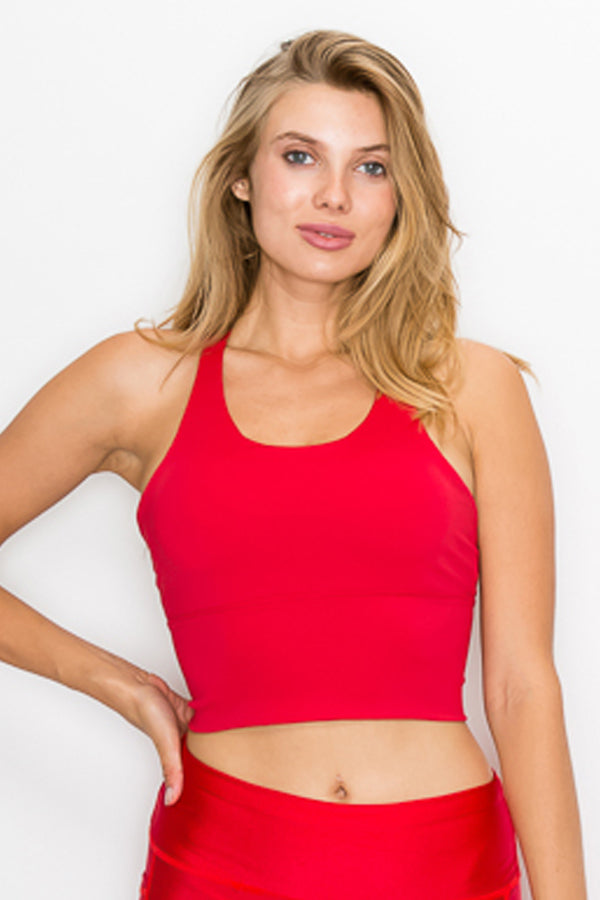 A stylish Strappy Back Crop Top featuring a trendy strappy back and corset tie at the waist, perfect for active wear.