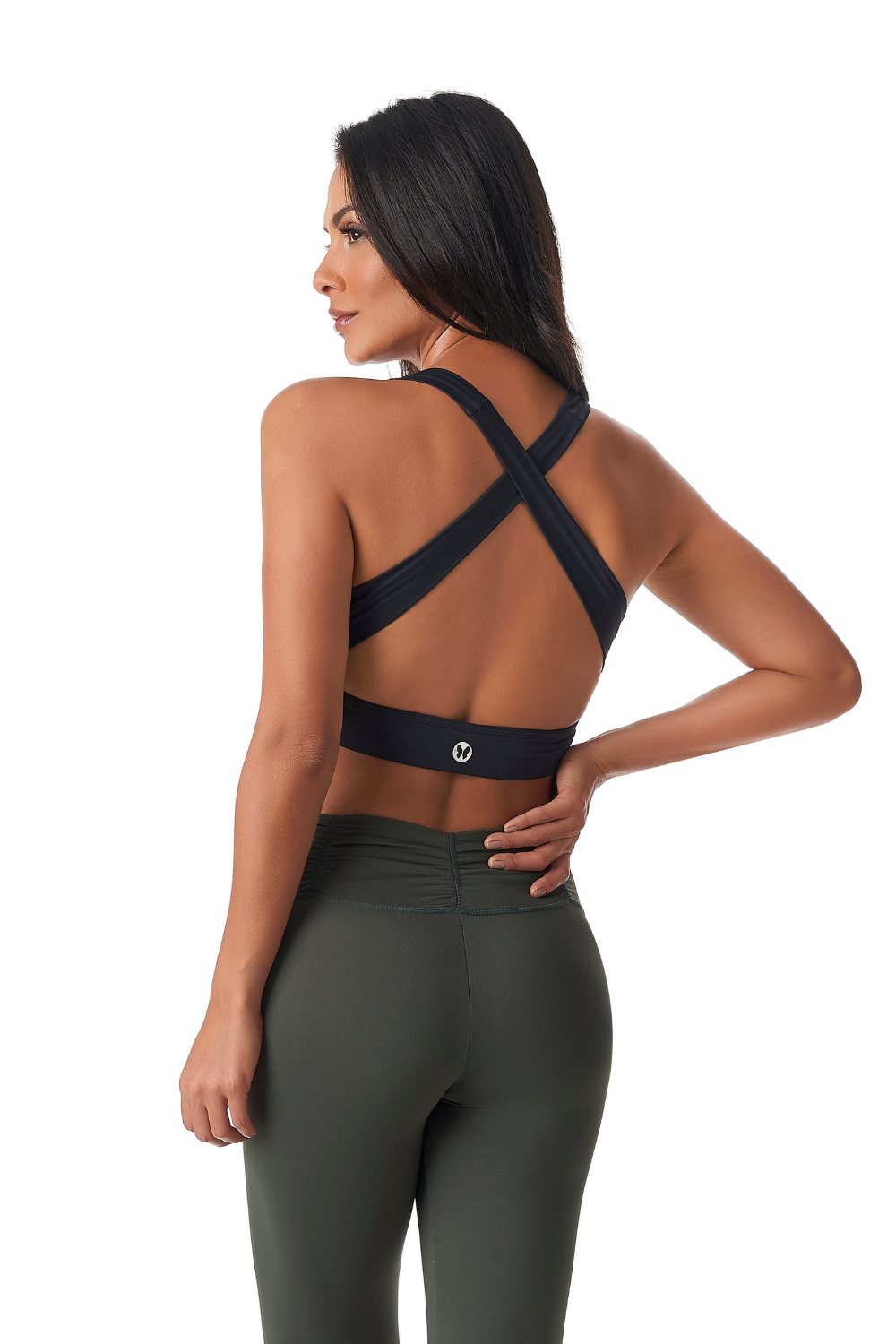 Tame Cupped Sports Bra featuring wide straps and criss-cross back design, made from cotton and spandex, available in black and navy.